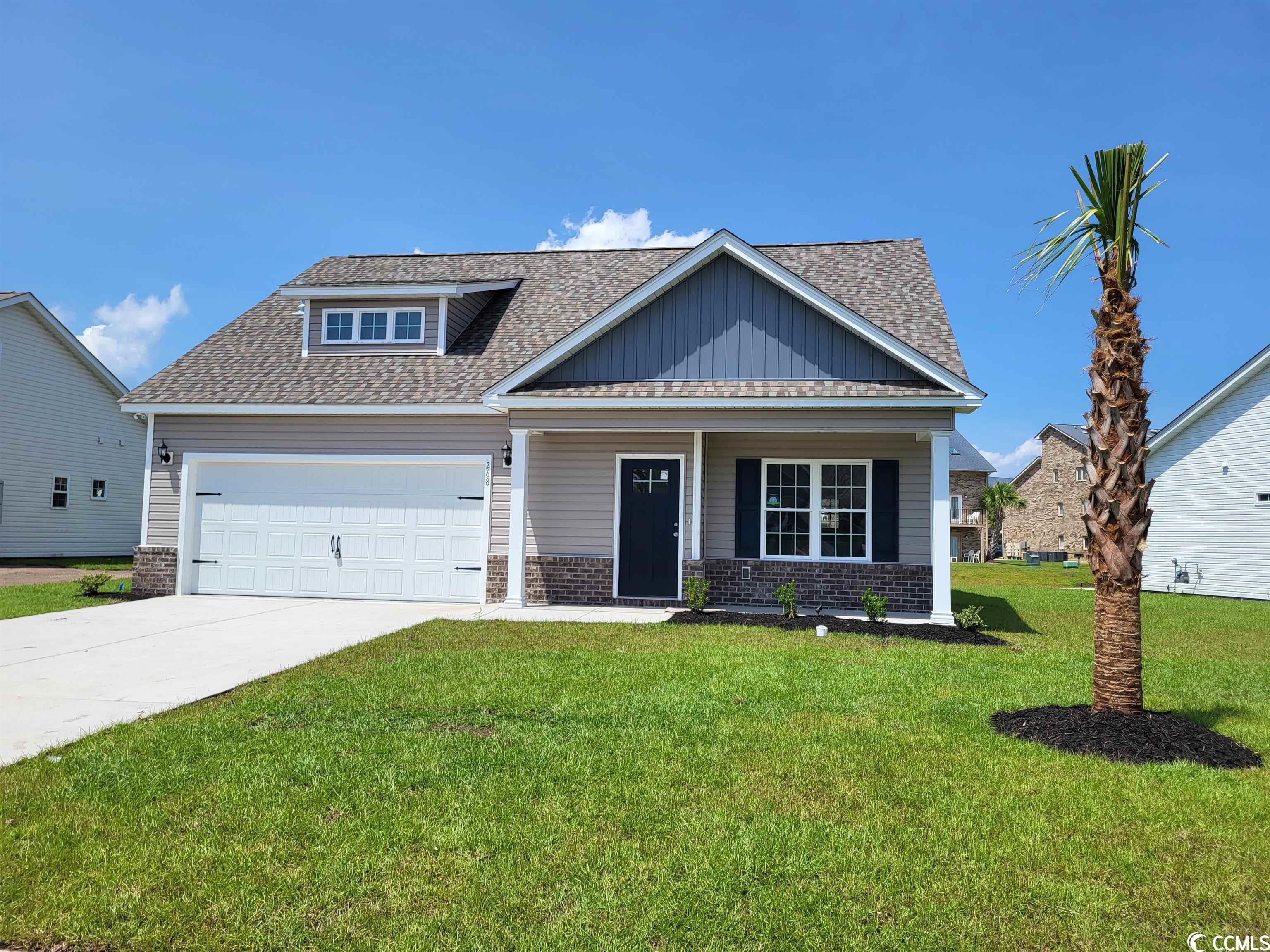 golf cart to the beach from this beautiful custom floor plan, on a direct pond lot, by the local builder voted best of the grand strand for the third consecutive year! in the ocean palms community (voted best neighborhood!), and almost complete and ready for you to move into. a welcoming front porch, a large rear porch and tons of windows to frame the gorgeous pond views are the defining features of his home. this terrific 3 bedroom, 2 full bath, 1 half bath, open floor plan home has wood-look waterproof lvp flooring throughout the first floor, with carpet on the second floor.  stainless appliances, staggered-height white shaker-style cabinetry, quartz counters, a cast iron farm sink, a pantry and a convenient breakfast bar combine to give the kitchen the wow factor you're looking for, and the abundant recessed lighting, three sets of double windows, four windows in the carolina room and  and a full glass door flood the home with light. the carolina room and dining area are combined - use it as an absolutely huge dining room or as two separate rooms, whichever works best for your lifestyle. the glass door leads to a covered porch with a large separate patio, to take advantage of the beautiful pond view. the spacious owner's retreat features quartz counters with undermount double sinks and an oversized walk-in shower, with plenty of storage in the cabinetry, linen closet and the huge walk-in closet. a half bath for your guests is tucked under the stairs and two additional bedrooms and a full bath are upstairs. all of the homes in ocean palms come standard with the luxury and efficiency of natural gas (tankless water heater, gas heat and a five-burner gas range). the fully-sodded yard has an irrigation system, front and back. the garage is completely trimmed and painted, with a wifi-enabled garage door opener. ocean palms is conveniently located near shopping, restaurants, schools and world class medical offices and hospitals, and a short golf cart ride to surfside beach's gorgeous beach and the atlantic ocean. other floor plans and inventory homes may be available. community pool and cabana!