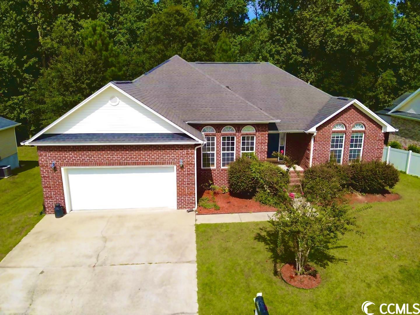 located in the magnolia bay community of conway, sits the stunning single family home with an oversized two car garage. recently refreshed and updated kitchen! enjoy the multi-level outdoor entertaining area, overlooking the backyard, which leads to a private entrance downstairs. the large lower level of the brick house has enough space that it could be converted into a multipurpose game room, an in-law suite, or an extra bedroom. it has brand new carpet, and it’s own half bath. on the main level of the home, there’s a split floor plan with a lot of natural light. the primary suite is on the opposite side of the home from the other two bedrooms. plenty of room for everyone!