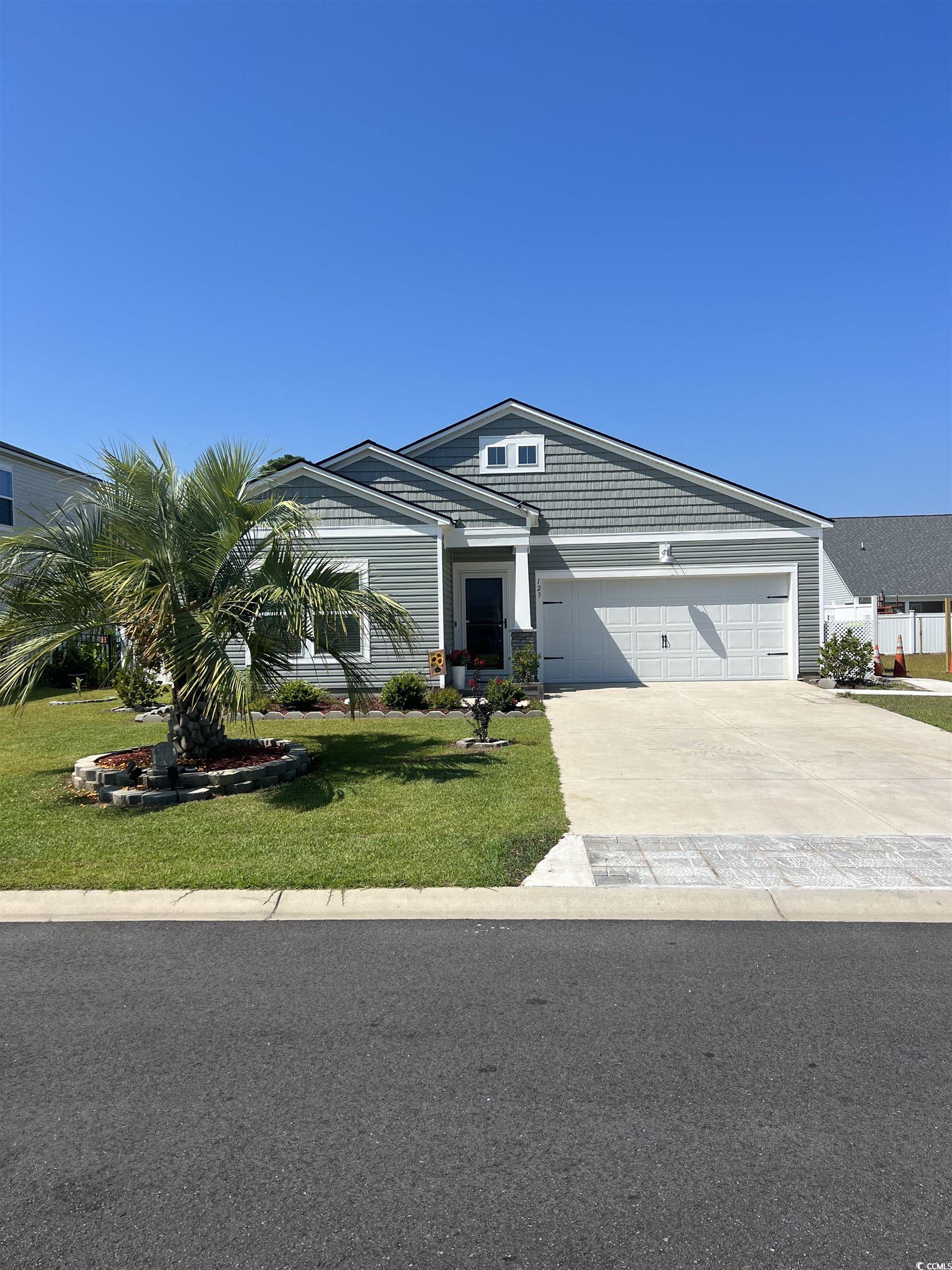 a gas community with tankless water heater and gas stove. the home features granite countertops in the kitchen with subway tile backsplash. stainless steel appliances, washer/dryer and laminate flooring in the main living area. dover floor plan.