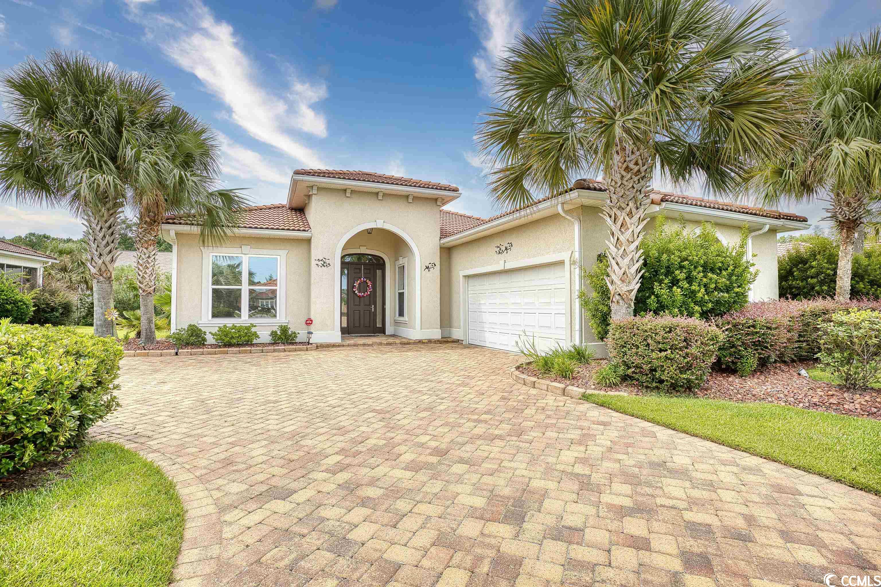 don't miss this opportunity to own this single-level 3 bedroom, 2 bathroom home in the quiet community, north village in little river. this home features a spacious open floor plan of the main living areas, with 11 ft ceilings, 8 ft doors, plenty of upgrades and all tile flooring throughout, and a fireplace with built ins as a main focal point. the kitchen is equipped with all stainless steel appliances, a backsplash, work island, granite countertops, plenty of cabinet and counter space, and tray ceilings with recessed lighting, leading to your laundry room and the 2 car garage. the master offers tray ceilings with a ceiling fan, a large walk in closet, and private master bath with double sink vanities, whirlpool tub, and separate shower, while the remaining two bedrooms also include ceiling fans, plenty of closet space, and easy access to the second bath. enjoy afternoons relaxing with friends and family in your huge screened in porch with roll down shades and upgraded tile flooring, or socializing with friendly neighbors in the community! the backyard includes tall hemlock trees for added privacy. other features include termite bond, wifi controlled irrigation, generator hookups, hvac in 2020, water heater 2018, appliances 2019, garbage disposal 2020, and a beautiful brick driveway. perfectly situated close to hwy 31, schools, and grocery stores, and just a short drive to all of the grand strand's finest dining, shopping, golf, and entertainment attractions. you won't want to miss this. schedule your showing today!