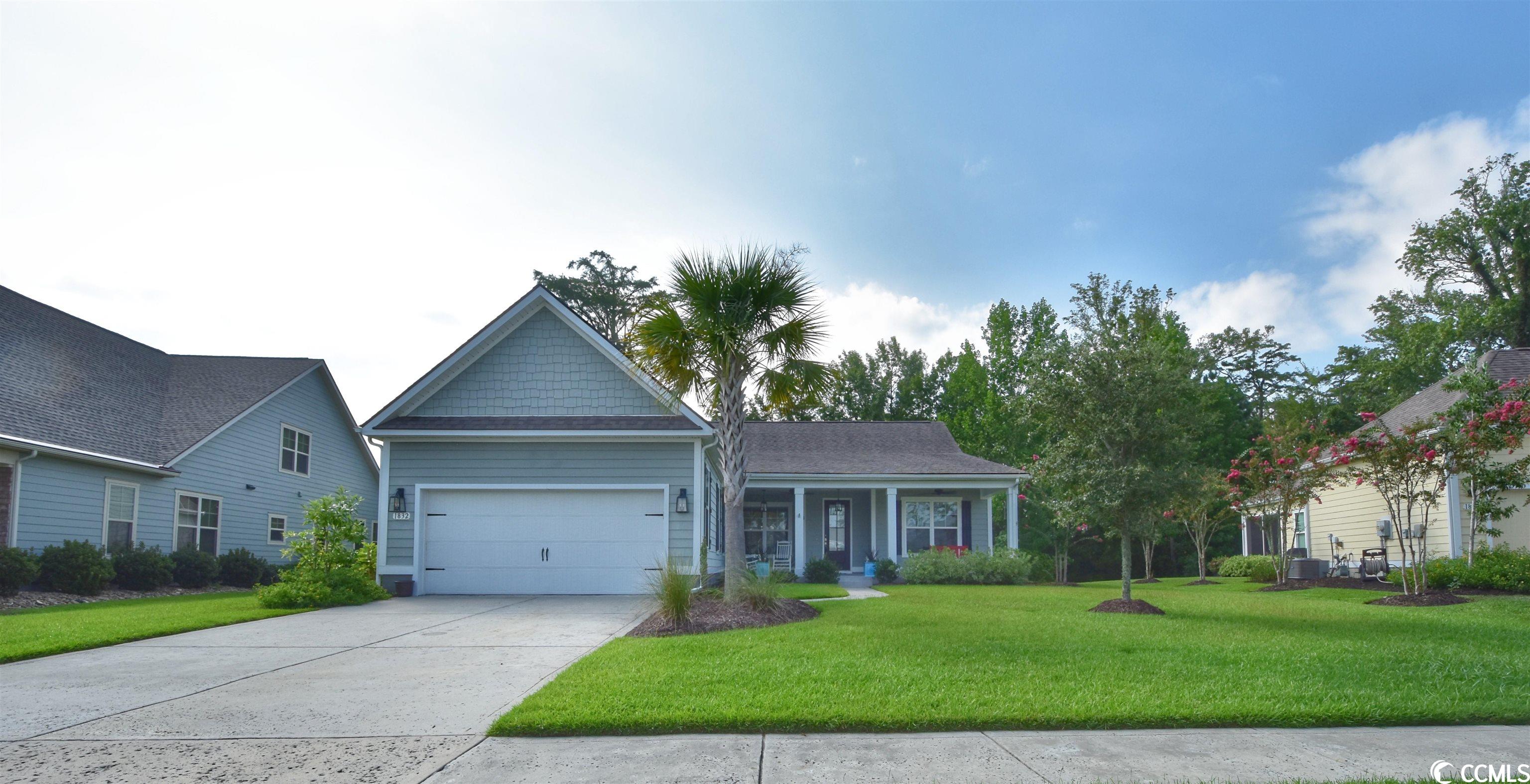 Wow! This truly is a rare find on the water with .38 lot size in the upscale, natural gas gated community of SEABROOK PLANTATION. As you walk up to your home you will be greeted by a large front porch with porcelain tile and ceiling fans. This house has it all with 3 bedrooms and a flex room that could be a den, office or whatever else you might need extra space for.  The open floor plan between the eat in kitchen, formal dining room and family room make it perfect for entertaining.  Enjoy water views from several rooms and double sliders to an oversized screen room with porcelain tile overlooking your private oasis.  The yard is perfect for a pool, patio or just the way it is with spectacular views and trees for privacy.  This location can't compare to anything else in the community.  Seabrook is also home to a RV/boat storage lot, pool, hot tub and community activities.  It is also walking distance to a major shopping center with Publix, Hobby Lobby, Pet Smart, several restaurants and so much more.  Less the 2 miles to Cherry Grove beach, so hop on your golf cart or take a nice walk.