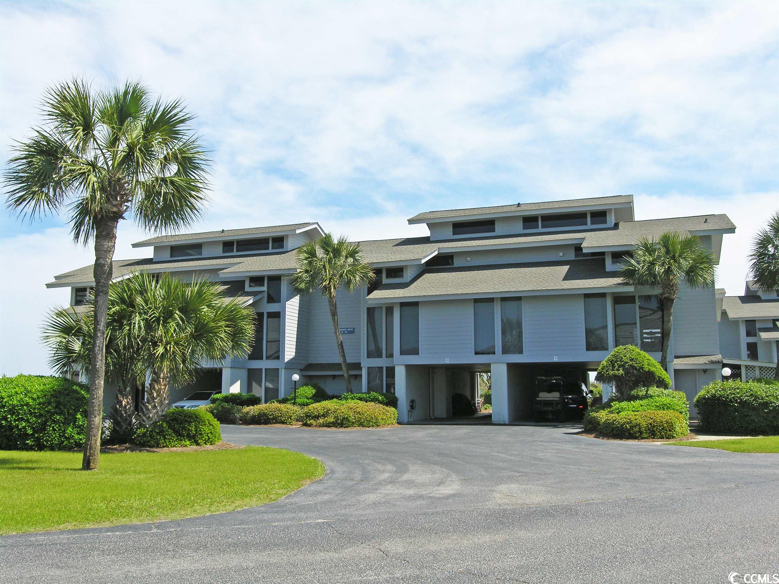 enjoy the vacation of a lifetime by sharing the cost of a coastal lifestyle through interval ownership. inlet point 2-c provides deeded ownership of 4 weeks per year (1wk/season) for each interval. turn day is monday. located within a gated community uniquely located on a peninsula bounded by the atlantic and a tidal salt marsh creek. magnificent ocean views, lowcountry decor and oak floors give this condo a seaside cottage charm. main floor common areas open to a sundeck and screened porch. additional features include electric log set fireplace, fully equipped kitchen, impeccable weekly housekeeping, ceiling fans throughout, covered parking and outside storage. owners may have one dog and can rent their weeks. no smoking. this 3-story condo has bedrooms on every floor. two on the top floor are en suite - one has a queen, the other has a king and oceanfront screened balcony. the main floor has one bedroom with a queen and full bath. the "no stairs" ground floor has one en suite bedroom with twins and patio walkout. amenities include private beach access, two community pools (1 olympic), hot tub, creek dock, and 24-hour guarded security gate. this property is an interval ownership.
