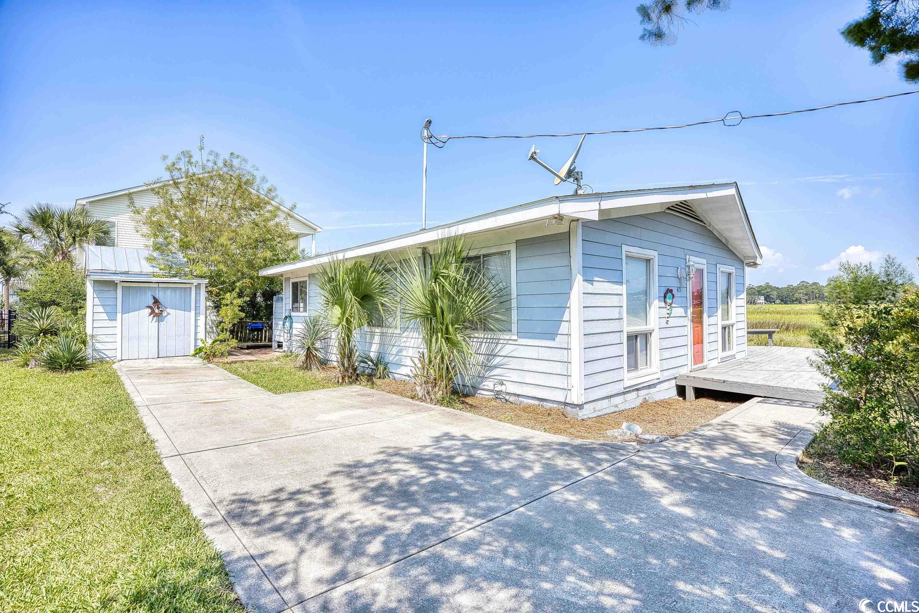 don't miss your opportunity to own this 2 bedroom, 1 bathroom home on the marsh, located in the heart of north myrtle beach! this home sits on a double lot on the marsh, where the second lot is not buildable, so the view will never be obstructed! in an area with no hoa, and just two blocks to the beach! fully furnished and equipped with all appliances- this home is truly ready for you to move in or start renting immediately upon closing. upgrades include an hvac only 4 years old, new hot water tank being installed 11/9/23. roof that is less than 5 years old, water heater replaced in 2017, a detached storage shed, plenty of parking, and an incredible location for a primary or investment home on the beach! enjoy afternoons relaxing on the huge deck, on the enclosed patio with upgraded trex, or spend your days at the beach- coming home to an outdoor shower, parking your golf cart in the shed and living the beach life! conveniently located close to all of the grand strand's finest dining, shopping, golf and entertainment attractions. seller will consider owner financing. schedule your showing today!