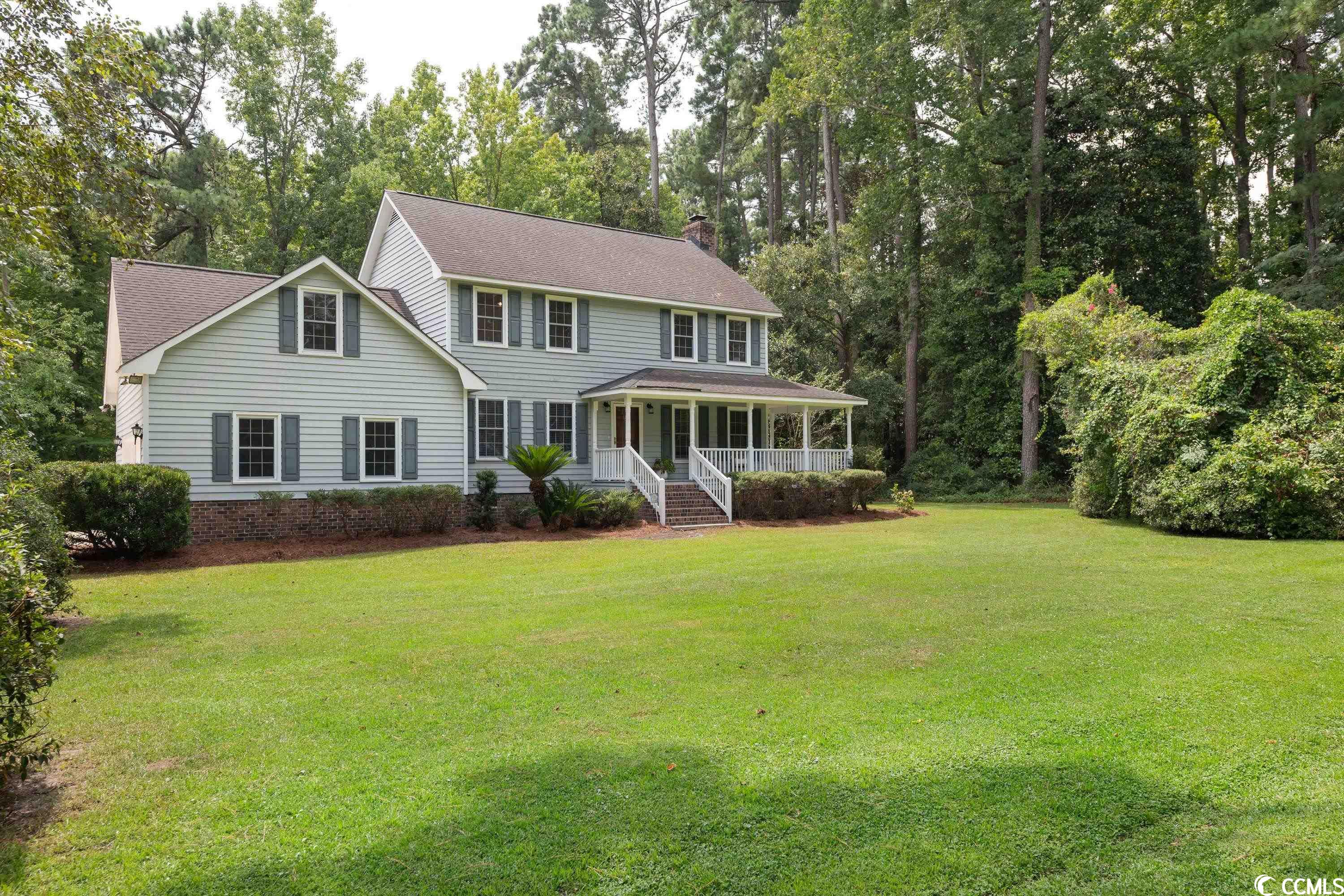 welcome to 2810 wedgefield road, a charming home located in the highly sought-out neighborhood of wedgefield plantation! spanning just over half an acre, this private corner lot backs up to green space, providing a natural buffer and a peaceful backdrop. the 3-bedroom, 2.5 bath home boasts a seamless blend of traditional and modern elements. the ground floor layout includes a spacious living room featuring a wood-burning fireplace, formal dining room that's ideal for hosting gatherings, a newly updated kitchen with eat-in area, laundry room, and a powder room.  take one of the two staircases upstairs where you'll find the primary suite, 2 guest bedrooms, and a shared bathroom. the large bonus room above the garage would be ideal for a playroom, fitness space, home office, or additional living quarters. for those who appreciate the waterfront lifestyle, the neighborhood's boat ramp is conveniently located just two blocks away. this offers easy access to the black river and the opportunity to explore all the beautiful coastal sceneries of georgetown. schedule a showing today!