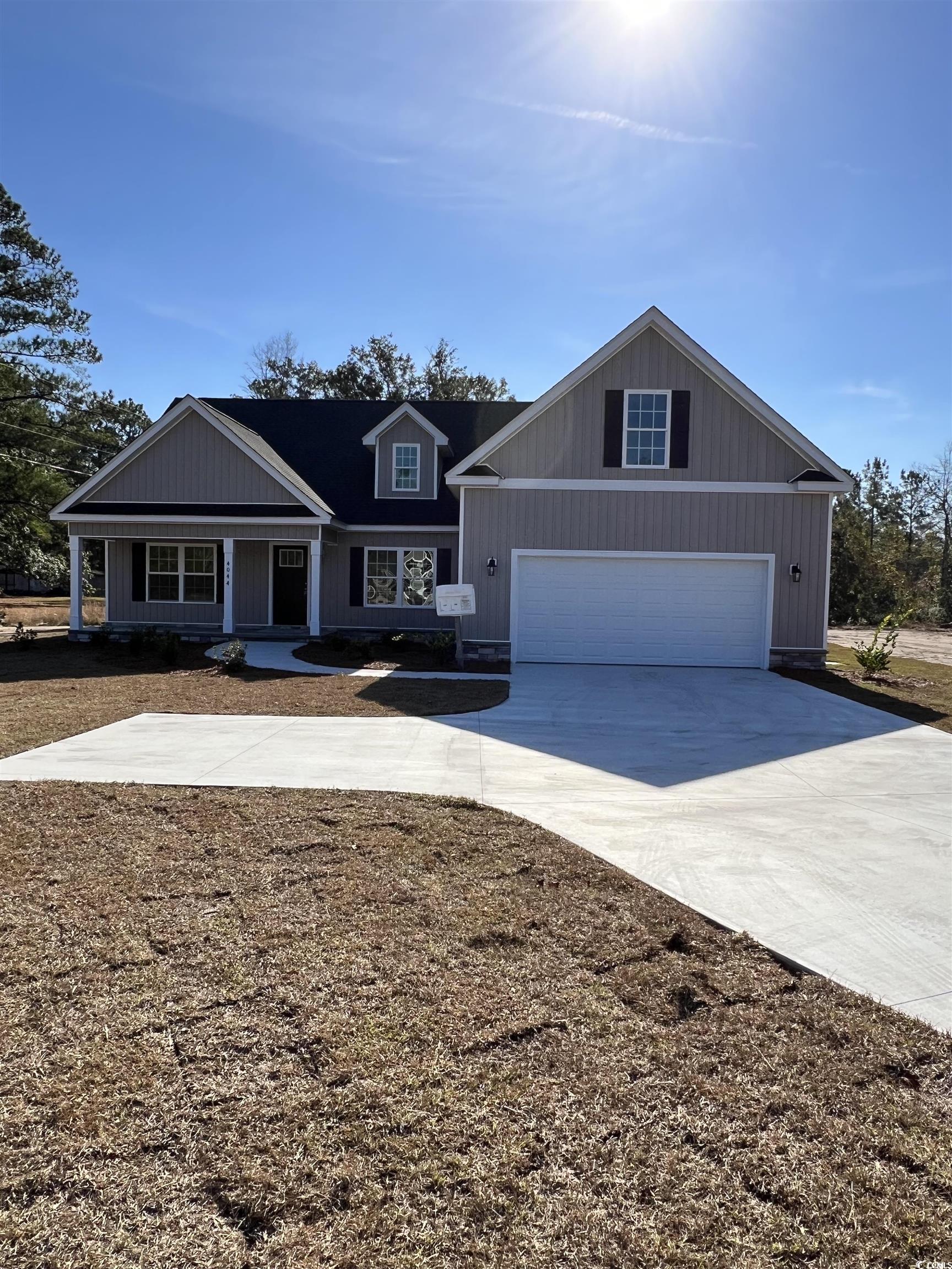1 acre lot & 1.33 acre with the road easement. no hoa. under construction! absolutely gorgeous lot. finished w/in 30 days with a contract! granite in all 3 bathrooms: 4 bedrooms: awesome floor plan. vinyl board and batten. stone front foundation, almost 300' sqft finished bonus room & full bath over the garage.  stainless steel appliances.cathedral ceiling in great room and tray ceiling in master bedroom. nice driveway for ample parking with approx. 250 ft of back yard for 2nd garage/ workshop, rv, and boat! screened in back porch. there is a front porch, pantry, laundry room. approx. 20 minutes more or less to the beach, restaurants, malls and outlets. all measurements approximate.