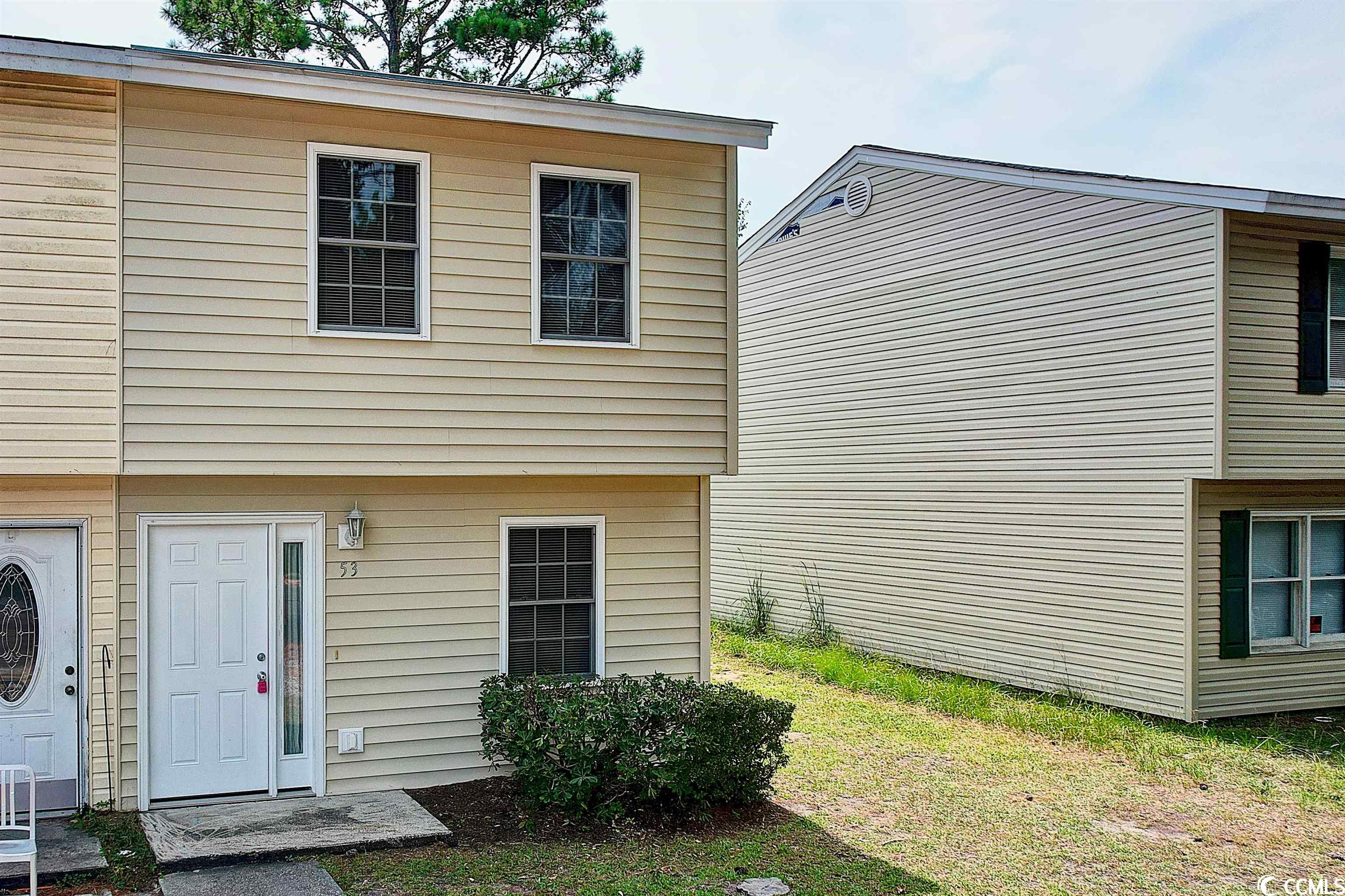 less than one mile to the beach sits this fully furnished, true townhome with no hoa! it is a wonderful opportunity to own a second home, investment property, or your permanent home in the heart of myrtle beach. the open floor plan offers a spacious living room with a wood burning fireplace and a beautiful accent wall. fireplace could be used with gas logs. sliding glass door leads to a private backyard that is fully fenced in, patio area, and attached storage space. there is a laundry room with a newer washer + dryer. the half bathroom is downstairs. leading upstairs are two bedrooms and one full bathroom. bedrooms have carpet flooring and one with a large walk-in closet. hvac was installed 8 years ago and has been serviced yearly. roof is only 3 years old and includes a 30-year warranty. this is a true townhome, the land comes with it and it can be approved for va, fha, or conventional financing. located by hwy 501 and 17, you will be minutes from the beach, golf courses, delicious restaurants, entertainment, myr airport, and more. schedule your showing today and don't miss out on this furnished townhome with no hoa.