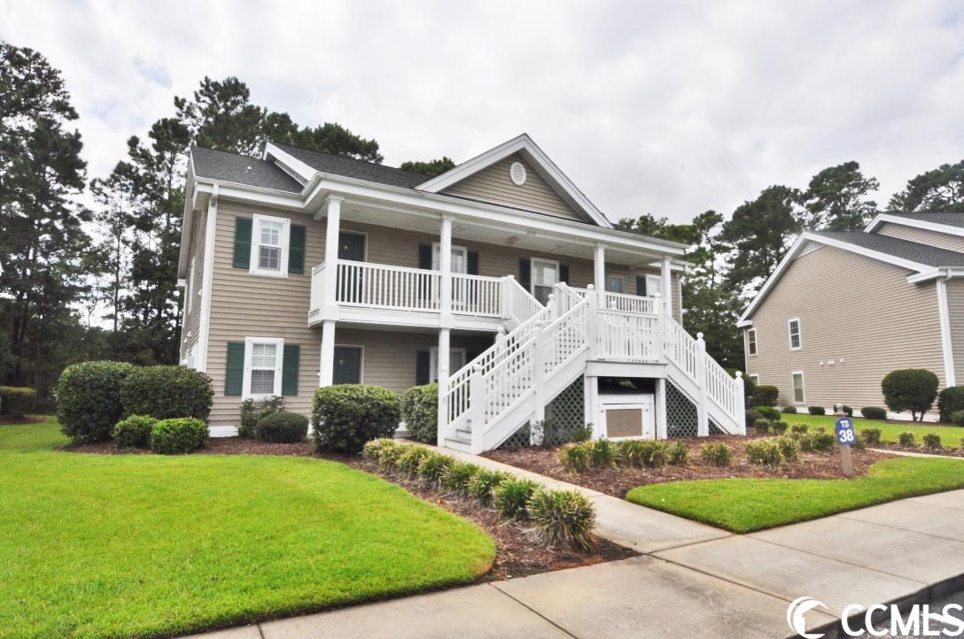 presenting 1015 blue stem drive, unit 38c—a two-bed, two-bath condo in true blue i in pawleys island, sc. positioned on the second floor, this end unit offers privacy and overlooks hole #10 of true blue golf course. recent upgrades include a 2022 renovation with a new water heater, garbage disposal, and kitchen faucet, as well as a refreshed custom tiled master shower. plantation shutters, washer & dryer, and a 2023 repaint enhance the space as well. enjoy a spacious screened porch, outdoor storage, and a master bedroom with walk-in closet and porch access. true blue community amenities feature five pools and tennis courts, appealing to leisure seekers and investors alike for short-term or long-term rentals. embrace the golf condo lifestyle in this coveted location conveniently located close to everything that pawleys island has to offer. please contact the listing agent, or your realtor, for any additional information or to schedule a showing. there is also a matterport virtual tour for this property that you may access.