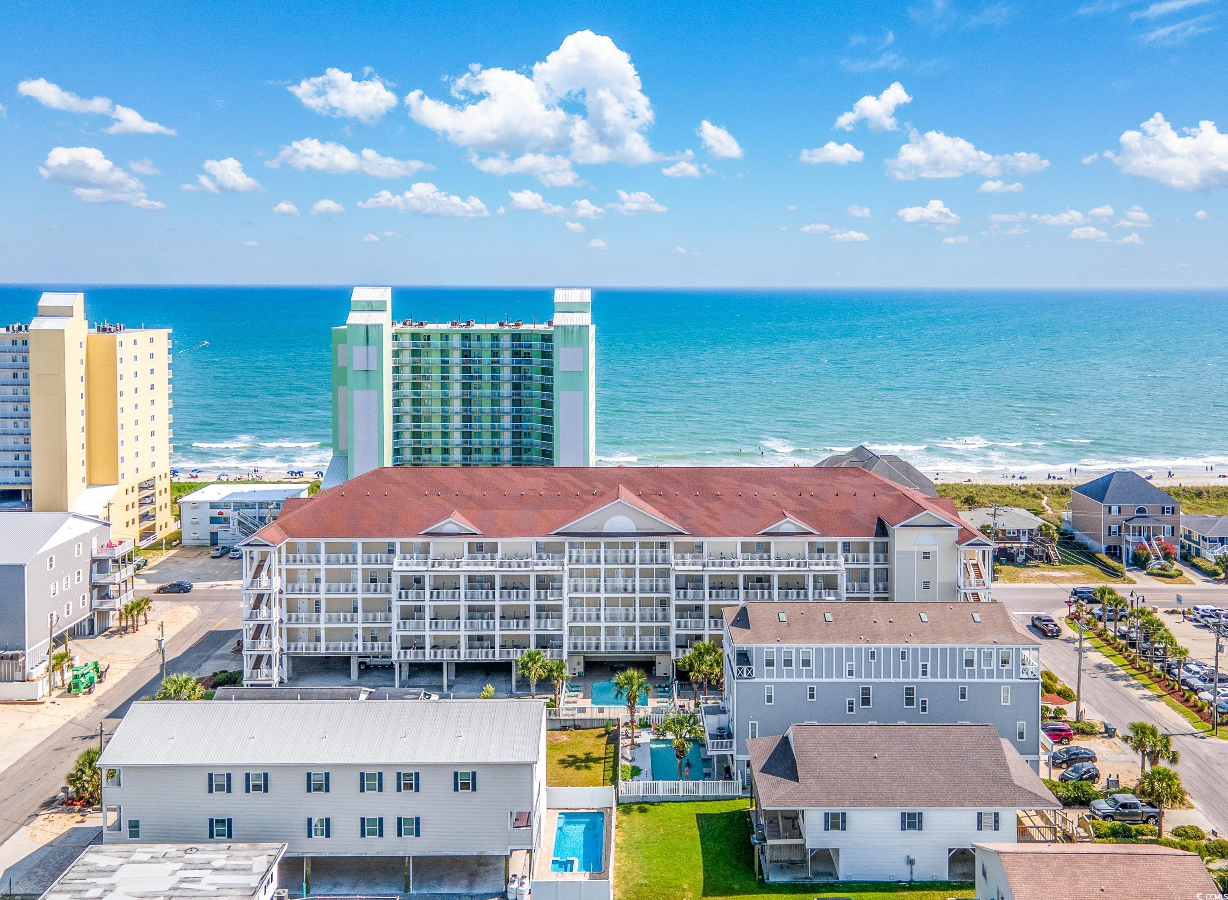 great investment opportunity in cherry grove!  this two-story 5 bedroom, 5 full bath condo is located on the second row in the family-friendly cherry grove section of north myrtle beach. this fully furnished condo features over 3,000 heated square feet of living space with 2 large balconies! the first floor features an open concept with tile floors in the living, dining area and kitchen. kitchen boasts granite counter tops, large work island with bar seating, all appliances and an extra refrigerator. also on the main level is another bedroom with a private bath and another full guest bath. the upstairs of condo features a large family room, 4 bedrooms, 3 baths and a large laundry room. there is also an elevator in the building.  more inside photos to come!  property amenities: community outdoor pool, hot tub and grill facilities for your enjoyment. great central location and ability to accommodate up to 18 guests, this unit has excellent year-round rental history. it is close to all the grand strand has to offer: great championship golf courses, good schools, excellent restaurants, entertainment, fishing, shopping, medical facilities, not too far from the myrtle beach international airport and of course, the beaches! all data is approximate and not guaranteed by the seller or the listing agent. buyer is responsible for all verifications.