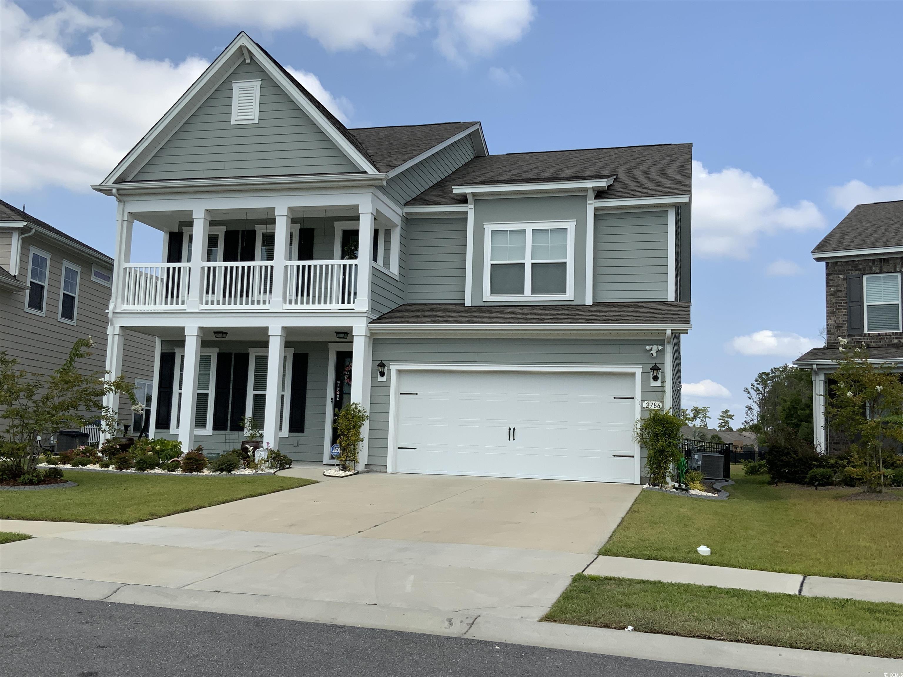 incredible curb appeal is an understatement given the stacked front porches and tall entry door. gourmet kitchen with granite countertops, 36" painted cabinetry, tile backsplash, stainless whirlpool appliances, and a beautiful butler's pantry right beside the large walk-in pantry. lovely flex space up front and wide-plank laminate wood flooring throughout the first floor main living areas. there is also a private bedroom and full bathroom on the main level which is great for guests visiting you at the beach and a spacious sun room. the second floor boasts a huge loft with ample closet space, two guest rooms, the laundry room, and the grand primary bedroom suite that will feature a sitting area, tremendous walk-in closet, and bathroom with separate vanities, tiled shower, garden tub, and linen closet.  all windows have alarm sensors. this community offers an amenity center featuring an air conditioned indoor pickle ball court, large pool, hot tub, fire pit, and walking and biking trail. residents can reserve the amenity center for gatherings and events.  measurements are approximate and must be verified by buyer.