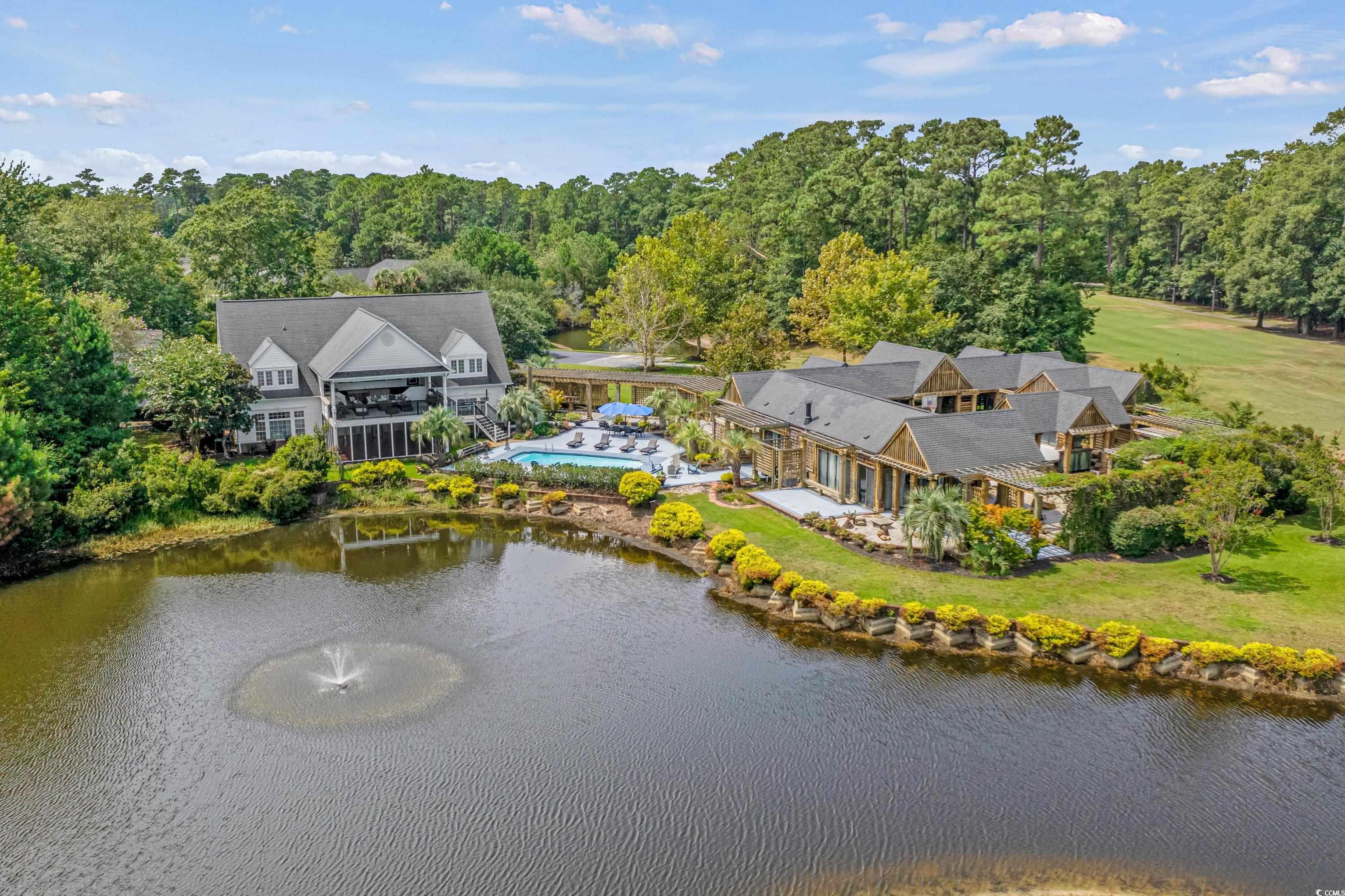 don't miss out on this incredibly rare opportunity to own an estate situated on a sprawling 3.34 acres within the exclusive and highly sought-after gated golf community of wachesaw plantation east. this stunning property offers breathtaking views overlooking the 18th hole, providing the perfect backdrop for luxurious living. the recently renovated main house features 4 bedrooms and 2.5 baths, showcasing an open concept floor plan with soaring high ceilings. the heart of the home is the chef's kitchen, which boasts an enormous waterfall island, top-of-the-line stainless steel appliances, and a custom walk-in pantry. enjoy the convenience of a ground-level porch off the pool deck and a second-level porch with a kitchen, both offering unparalleled views of the picturesque 18th hole. for your guests, there is a one-bedroom guest house located just steps away from the pool deck, affording them their own private oasis with breathtaking views. an entertainment courtyard awaits, complete with a personal clubhouse that features a formal dining area, a full kitchen, and a convenient half bath. additional amenities include a four-bay garage with a one-bedroom apartment located upstairs, providing ample space for both vehicles and guests. a gym is also located at the rear of the garage, ensuring that fitness enthusiasts have everything they need right at their fingertips. the yard is fenced in between the main house and garage, and a separate workshop building offers even more versatility and space. this is truly a remarkable property that offers the utmost in luxury and privacy. schedule your private viewing today!