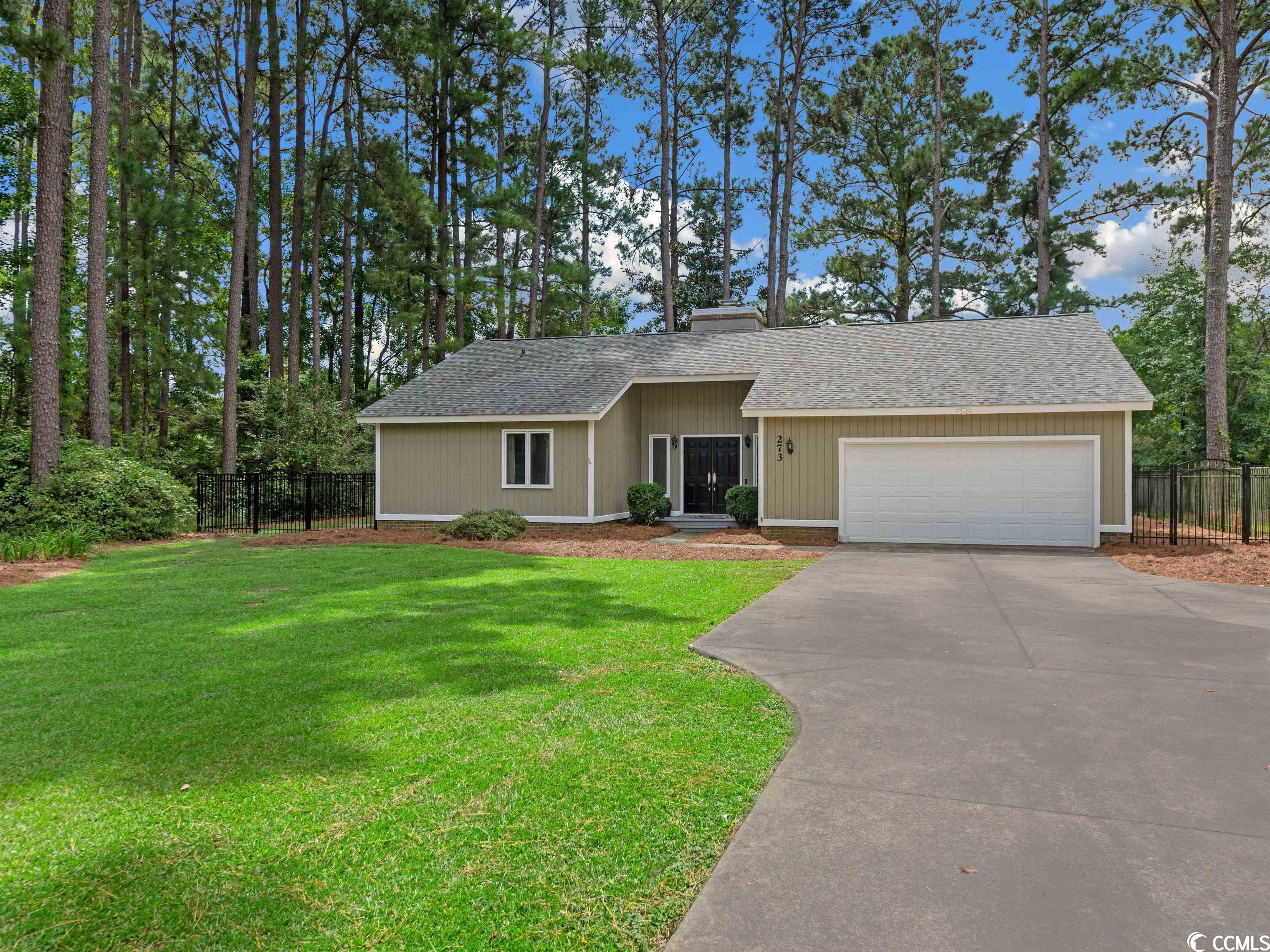 this beautiful 3 bed/2 bath home, renovated in 2019, on .41 acres, with a  fenced in back yard is move in ready! this ranch style home, features a wonderful fireplace in the great room opening up to an enclosed porch that has a door to the patio. the flow from foyer, living room with vaulted ceilings, to the porch, kitchen, dining room and patio is wonderful for entertaining. the split bedroom plan features the spacious master suite with linen closet. the additional two bedrooms share a bath that opens to the hall for easy access. the spacious 2 car garage is equipped with pegboard to hang all yard items, etc.  roof 2019, hvac 8/2022, 2019 all new flooring, lighting, vanities, complete painting inside and out, your routine maintenance will be minimal.  wedgefield plantation is located in a lovely southern setting with gorgeous live oaks, has its own private boat ramp and landing leading into the black river and on to the intercoastal waterway, a beautiful golf course with new pub for dining and optional pool membership. downtown georgetown is less than 10 minutes away where you will enjoy dining, shopping, museums, art galleries and the harbor walk. the beautiful beaches of pawleys island are just a 20 minute ride north. charleston and myrtle beach are approximately an hour drive away. this move in ready, fenced in yard home in wedgefield plantation is the perfect place to call home!