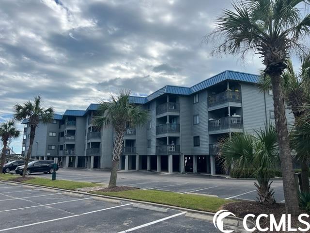 newly remodeled, first floor, corner unit in the highly sought after complex of sea cabin in the cherry grove section of north myrtle beach. parking is under the building (and connecting lot) with unit located at the top of the first staircase. this unit, used only as a second home, has one bedroom with an area with built in bunk beds for additional sleeping space. the hvac is 4 years old and the kitchen has new stainless appliances, cabinets, granite counters, backsplash, garbage disposal, and new trex furniture on the balcony. there are spectacular views of the beach and the atlantic ocean from the private ocean front balcony. there is a laundry room and storage room located in the hallway just outside the unit. the large pool is across the street and there is a private pier for use by owners and guest. the pier is currently closed for repairs. sea cabin is located near the very quite  point in cherry grove but is also close to all the activities that north myrtle beach has to offer.