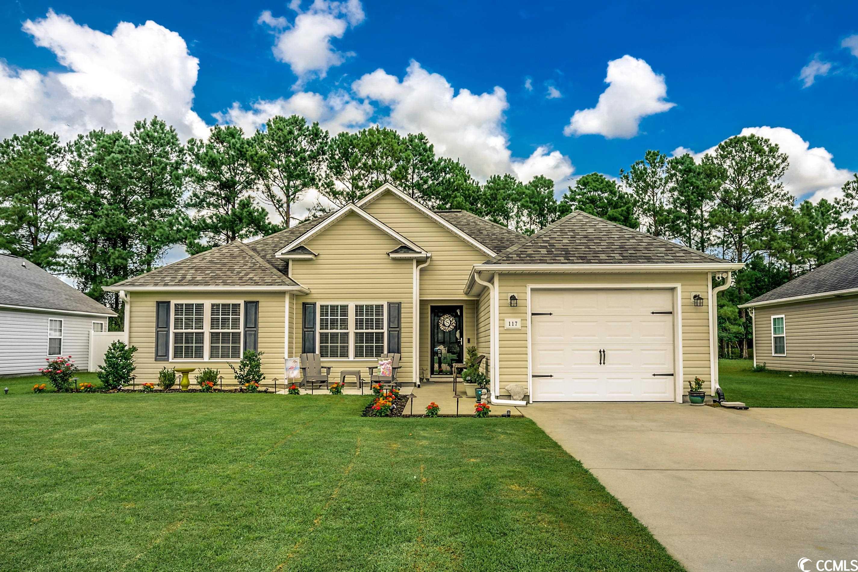 welcome to 117 cottage creek circle where pride of ownership is evident throughout this three bedroom, two bathroom ranch style home that is a true gem! at first glance you will notice the well maintained landscaping complimenting the homes instant curb appeal with sprinklers to help keep it that way. at night time, the outdoor lights will illuminate to really make the home stand out. alongside there an extended parking pad for those extra vehicles. stepping up to the home there is a charming front patio providing a warm welcome to relax and enjoy the day. entering inside is a cozy living room with an electric fireplace as your focal point to the space. there is ceramic tile floor that adds a touch of elegance and easy maintenance throughout the home. to compliment the heart of the home--the kitchen, are sleek stainless steel appliances for all of your culinary needs. the master bedroom is a serene retreat with tray ceilings, a ceiling fan for added comfort, and a luxurious garden tub for those relaxing soak sessions after a long day. the garage has been transformed into a relaxing hangout space with an epoxy floor and a lifestyle screen door offering endless possibilities for leisure and hobbies. this property also boasts a large fenced in backyard with a back patio for hosting bbqs and gatherings as well as a magnolia tree adding beauty to your outdoor oasis. there is even a storage shed for all of your tools, toys, and yard belongings. rest assured, your newly installed hvac ensures your comfort year round. don't miss this opportunity to make this house your home--a perfect blend of comfort, style, and entertainment waiting for you! square footage is approximate and not guaranteed. buyer is responsible for verification.