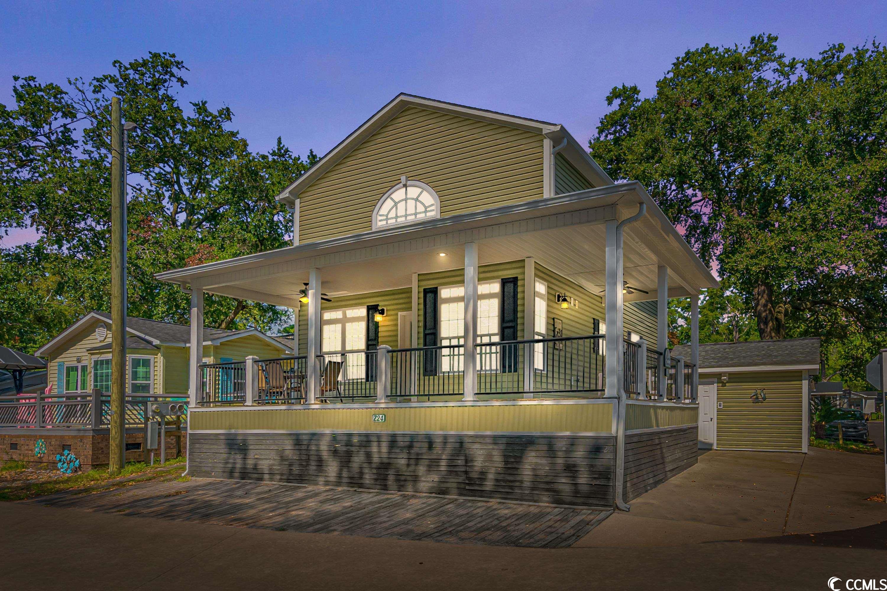 located in the heart of ocean lakes family campground, a vibrant beach community, this 3 bedroom, 2.5 bath beach house offers the best of both worlds – a serene escape from the everyday hustle and bustle, yet within easy reach of local amenities, dining, and leisure activities. don't miss out on the chance to own a unique piece of coastal architecture that redefines beachfront living. this home has a vapor barrier underneath to help protect it from any moisture. the expansive deck, an enclosed outdoor shower, and great outdoor space are just some of the outstanding features of this home! experience the magic of living above the ordinary, where every day is a celebration of the sea and the sky.