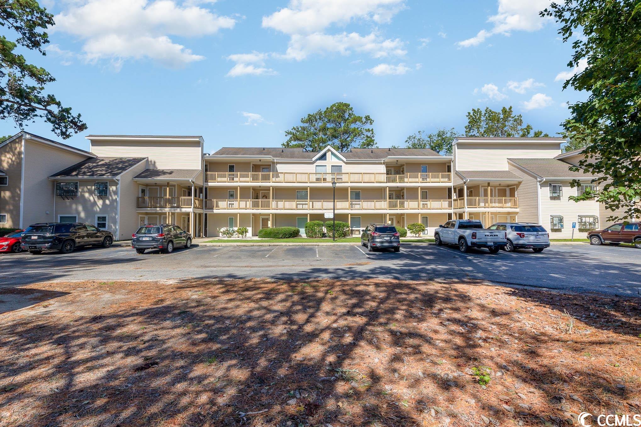 what’s not to love about this beautiful, partially furnished 2b/2b condo in baytree golf and racquet club? located less than ten minutes to cherry grove beach and north myrtle beach’s excellent restaurants, this top floor, end unit has a unique floor plan that includes an additional front entrance to the second bedroom with space and plumbing for a kitchenette—double the rental potential. the primary bedroom and dining room feature elevated ceilings. huge windows in every room let in a ton of natural light and beautiful views of the lake and mature trees. this property features an updated kitchen with stainless steel appliances and three balconies. the beautiful outdoor pool and hot tub are perfect for summertime swimming, and enjoy the heated, glass-enclosed indoor pool year-round.  as you enter the property, two entrance doors lead to the main living area and the lockout room.  entering through the main door, the entryway is painted a serene, coastal blue along with tile and luxury plank flooring.  traveling through, you will enter the living area that opens onto beautiful lake and forest views from the large windows and the sliding glass doors leading to the first of three balconies. to the right, you will find the 2nd bedroom/ lockout space with a separate entrance from outside. this space features a private balcony with lake views, large closet, and full bathroom and is also equipped with plumbing and electrical to add a kitchenette for rental income potential. returning to the living area, you will find a pristine kitchen that boasts wood cabinets, glass tile backsplash, and stainless steel appiances. there is plenty of cabinet and counter space for meal prep. now let's talk about the view from the kitchen and dining area! the kitchen opens up to the high-ceilinged dining space with enormous floor-to-ceiling windows that look out over trees, making the property feel like a treehouse. natural light floods the space and the forest and lake views provide stunning sunsets. what an excellent spot to enjoy a meal or coffee while enjoying the beautiful scenery and wildlife, including herons, egrets, and rare wood storks.  walking out of the dining space and to the right, you will see the washer and dryer area and a full bathroom with a pedestal sink. enter into the large primary bedroom with room for a sitting area or a workspace/home office. the high ceiling and expansive windows let in plenty of natural light and another sliding glass door leads out to the third balcony.  little river is the oldest town along the greater grand strand. located about 20 miles to the north of myrtle beach, this unique town is known for its fresh seafood, excellent fishing and signature golf courses, shopping, entertainment, shag dancing, and of course, the annual blue crab festival! relax amongst the centuries-old live oak trees and enjoy the local seafood from generations of commercial fishermen.