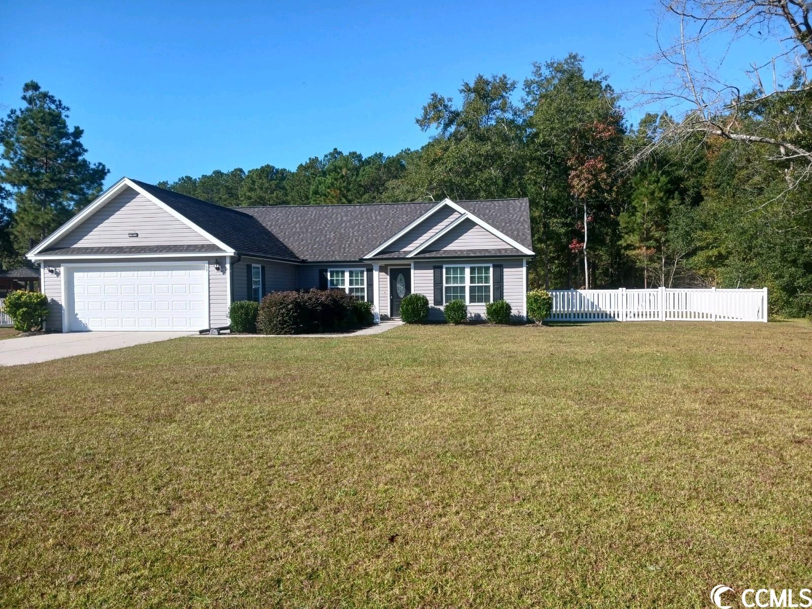 welcome to this gated community only 15 minutes from downtown conway and 30 minutes to myrtle beach. this immaculate 3 bedroom, 2 bath home sits on 3/4 acres on a premium pond lot. this spacious home has plenty of outdoor space. a large easy to maintain and landscaped front yard.  there is room for your boat, rv or trailer. enjoy the safety and security of a 2-car garage. you'll appreciate the open floor plan with cathedral ceilings in the great room and laminate flooring throughout.  the kitchen has plenty of counter space, stainless steel appliances and natural light from the bay window in the breakfast nook. primary bedroom has a tray ceiling, walk in closet and a master bathroom. *low step in shower.  this one level home has a split bedroom floor plan with bedroom #2 and bedroom #3 sharing a hall bath. this gated community is boat and rv friendly and it has a private boat landing for the development. the owner has left this home spotless and move-in ready. a lender credit is available and will be applied towards the buyer's closing costs and pre-paid if the buyer choose to use the seller’s preferred lender. this credit is in addition to any negotiated seller concessions.