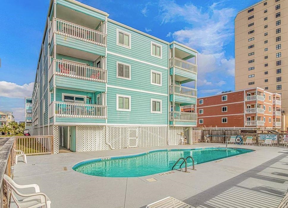enjoy coastal living in this charming 3-bedroom, 2.5-bathroom ocean view unit on the first floor at 824 n. waccamaw drive, unit #104 in garden city beach, sc. step inside to a private carolina room, and relish the convenience of a full-size stackable washer & dryer. this fully furnished unit comes complete with two sets of high end department store towels and linens for all beds. recent tile replacement and granite countertops add a fresh touch, enhancing the interior. notable features include an oceanfront pool, optimal ground-level storage unit near stairs and the prime location adjacent to the holiday drive beach access. the seahorse, an 18-unit complex, provides stunning views of the garden city pier from the pool area. explore nearby attractions, restaurants, shops, and the pier, all within walking distance. although currently not on a rental schedule to maximize showings, the seller boasts a successful rental history through vrbo. for your convenience, a matterport virtual tour is available. contact the listing agent, or your realtor, today to learn more or to schedule a showing. don't miss out on this prime coastal opportunity!
