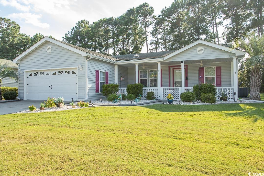 motivated seller !! beautiful, well-maintained lakeside crossing ranch with large rocking chair front porch conveniently located at the front of this desirable gated community and close to the amenities center. these homes are on permanent foundations. this  55+ (age -restricted) community has tons of organized activities and amenities including indoor and outdoor pools, tennis, party room, craft room, hot tub, fire pit, paddle boats, kayak dock, fish pond, pickle ball, putting green, fitness center, library, billiard room w/ bar, organized exercise classes, yoga, ballroom dancing, bingo &more at their award-winning community center --all included in the lot fee. this is not an hoa.  home is immaculate and has new lux vinyl plank flooring throughout, newer heat pump (2019), newer washer and dryer (2019),  built ins in liv room, extended height bathroom vanities, walk in shower and double sinks in master, walk in closets, large eat in kitchen, breakfast bar,  spacious bedrooms in a desirable split floor plan and full laundry rm, plus 2 car garage. backs to wooded area for privacy. lot fee also includes land tax, garbage pick up, lawn care and edging (not shrubs or flower beds) in addition to above amenities. be sure to visit the 2 impressive clubhouses and to get a copy of the newsletter and info on the activities, lot rates, etc. seller will pay 2 months of buyers lot fees at closing.