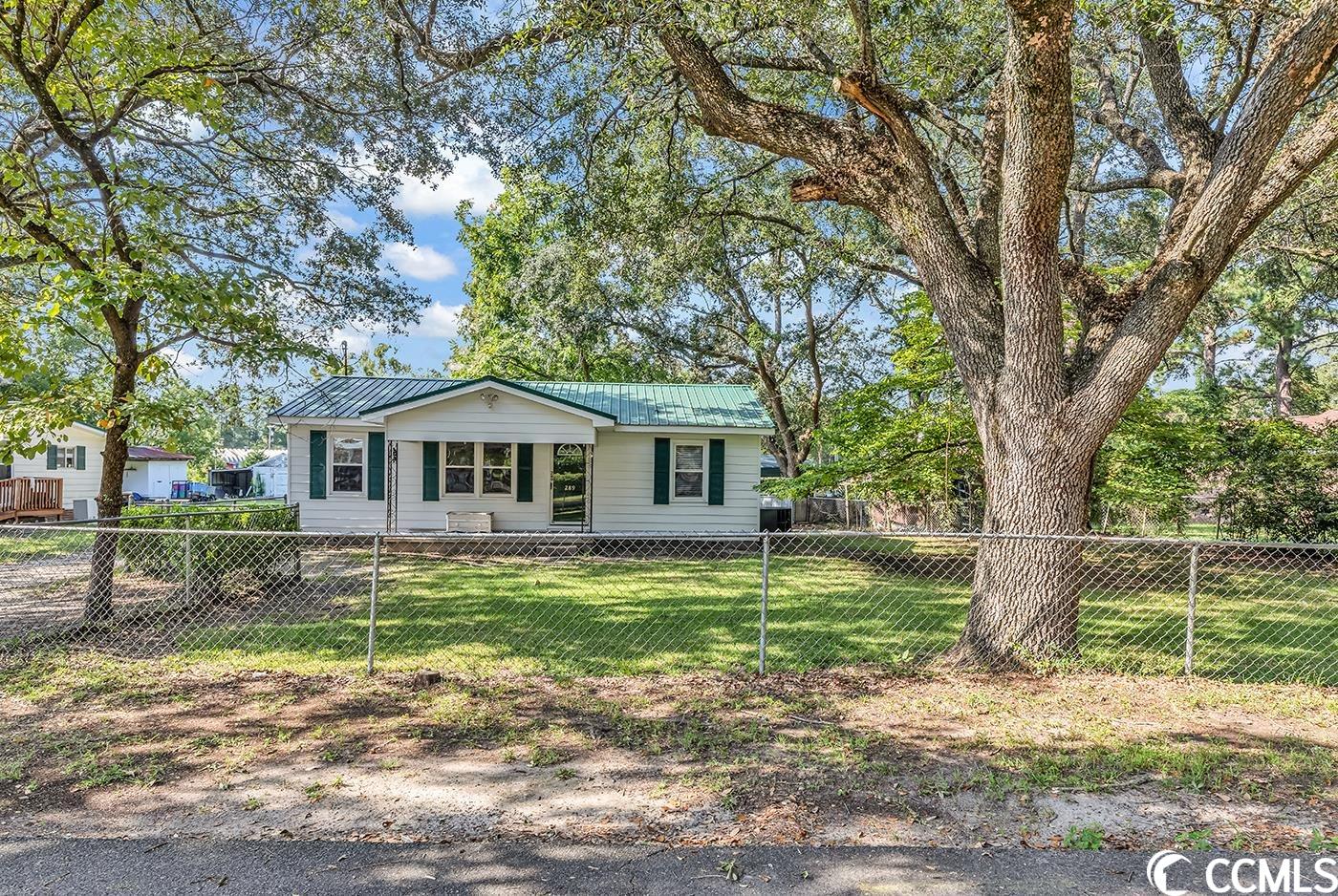 opportunity awaits just outside downtown conway! this 3 bedroom, 1 bathroom home is in a no hoa, well-established neighborhood. with stunning live oak trees this property offers a fenced in yard and a lovely covered back patio. from the front porch, you enter the home into a spacious living room that is the heart of the home. to the right are three bedrooms, and to the left is a dining area that leads to the galley style kitchen. the gas range and washer and dryer are 2020 and the hvac was installed in 2019. this home is full of potential and perfect for you! just minutes away from downtown conway, costal carolina university, conway medical center and so much more. check out the 3d matterport tour and schedule your appointment today!