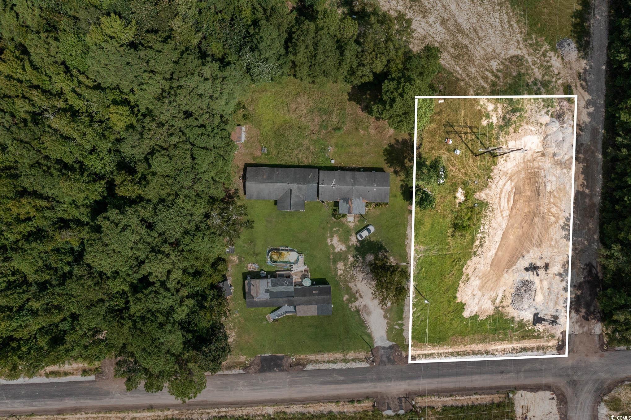 this expansive 1.3 acre rural residential lot on the corner of kinlaw ln and dennis lane combines the tranquility of rural living with the convenience of being just minutes away from the city's amenities.  this up and coming area is growing with lots of new neighborhoods.  this would be a great lot for a dream garden, barn or possible manufactured home.  take advantage of the nearby waccamaw river, providing opportunities for boating, fishing, and other water activities.  also available for sale is the lot next door at 810 kinlaw ln mls# 2318315 a large 1.52 acre lot with 3 manufactured homes.  combine the two lots and clear the land and build your dream home!   lots of options for these two parcels.