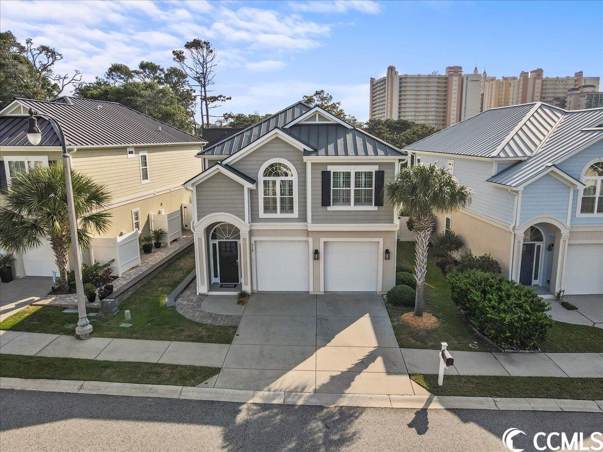 nestled within the desirable ocean hill community, this coastal gem is just two blocks away from the beach. this three-bedroom, three-bathroom home offers an abundance of living space. as you enter the home, on the first, you will find a spacious living room, a bedroom with a walk-in closet, and a full bathroom with a double vanity sink. upstairs, you will find an inviting open-concept floor plan with a large great room that seamlessly flows throughout the home. the newly renovated kitchen boasts updated cabinetry, a gas range, stainless steel appliances, and quartz countertops. the second bedroom upstairs features a built-in murphy bed and desk, offering versatility for guests or use as a home office. the master suite is equipped with a large bathroom featuring a double vanity and a walk-in closet. the master suite also provides direct access to the balcony. this home also includes an elevator, natural gas, luxury plank flooring, plantation shutters, an outdoor paver patio, all bedroom closets have been thoughtfully customized, and custom cabinetry/storage space in the garage! spend your days soaking in the community pool or at the beach; this home and location offer flexibility for both! ocean hill permits short-term rentals, making this home suitable for either a primary residence or an investment property. it checks all the boxes! don't miss the chance to make this ocean hill retreat your own—schedule a showing today and experience coastal living at its finest!