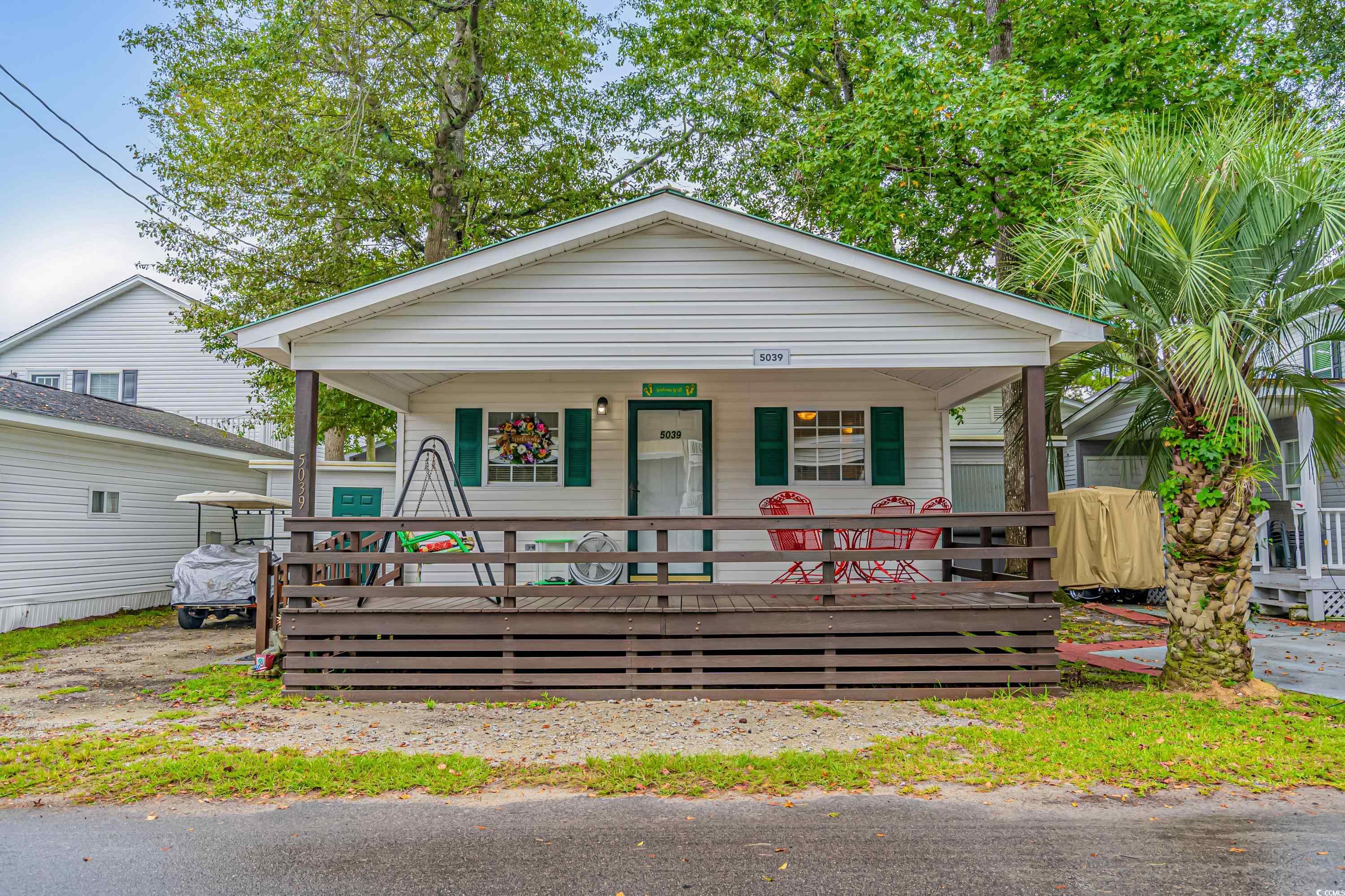 cozy two bedroom & two bathrooms cottage is the 5000 section.  built by the owner & nicely done.  great sitting porch to have a sweet tea during the day & cocktails at night.
