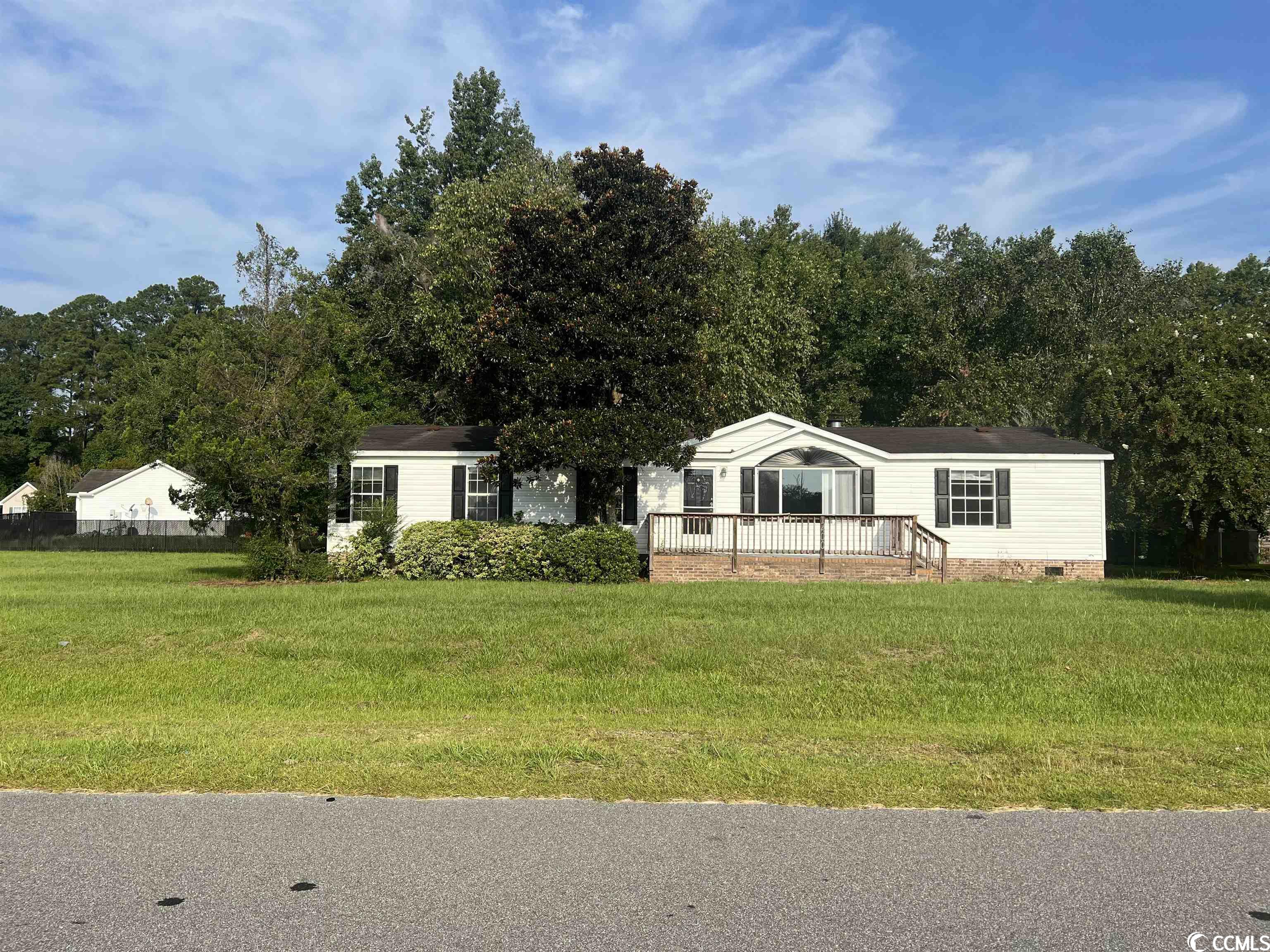 three-bedroom 2 bath 2000 fleetwood mobile home with no hoa sitting on .56 acres. excellent size kitchen with island, appliances, and pantry. master bedroom has walk-in closet and master bathroom has double sinks, tub, and shower with glass doors. large laundry room, with great storage space. huge back porch and nice wooded privacy behind you. with a little tlc this could be your next home or add it to your rental portfolio.  just a few minutes from downtown conway. seller is selling in as-is condition.