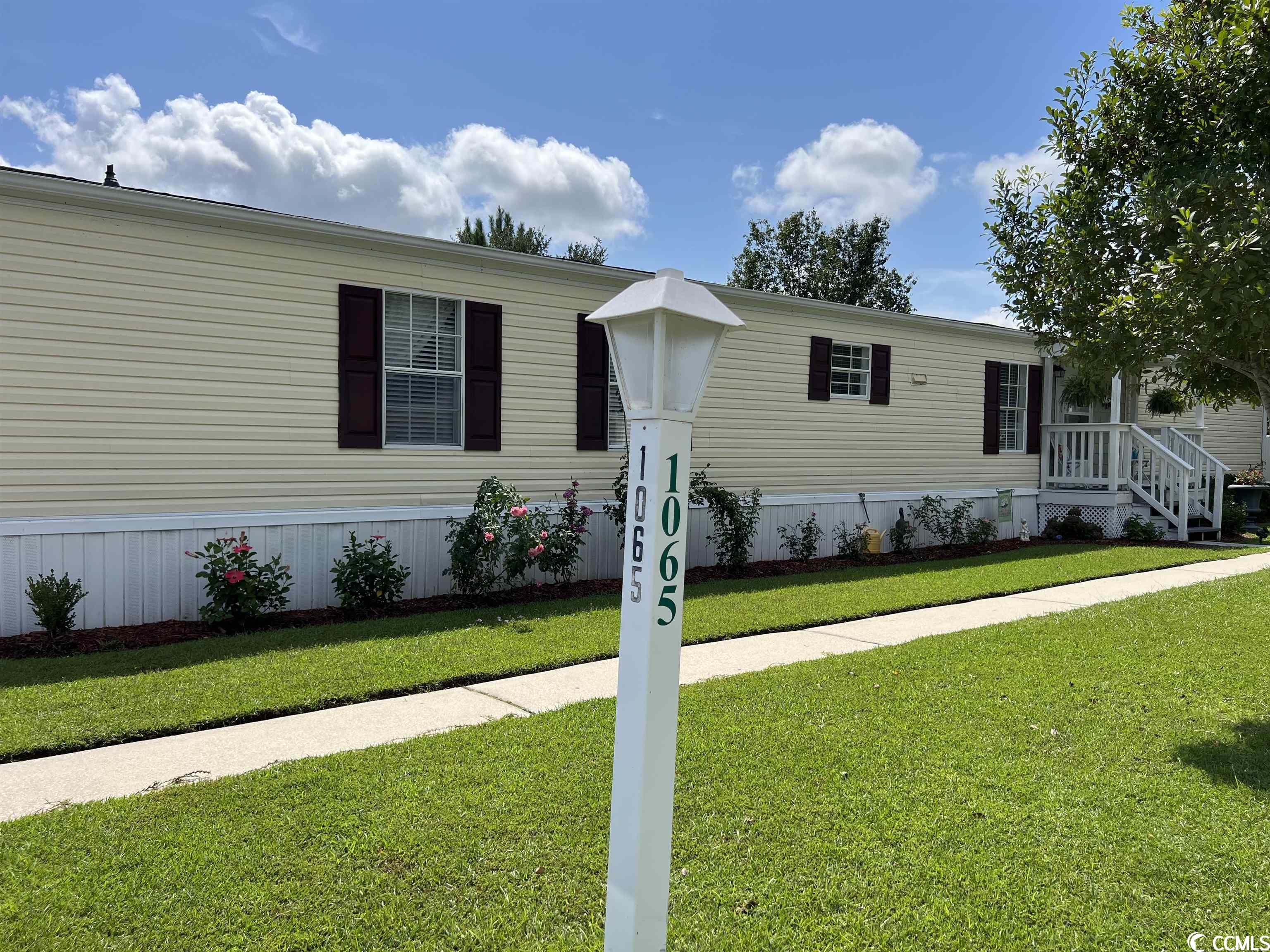 quiet living in conway plantation- a community which offers a pool, clubhouse, and many amenities for residents to enjoy. beautiful large 3 bed/2 bath on a large corner lot with large back deck, large detached shed, and an attached shed. close to everything that conway and myrtle beach has to offer-area shopping, colleges, hospital, rivers, and plenty of yummy restaurants. pet friendly. split floor plan. vaulted ceilings throughout. shingled roof. vinyl siding. laminate flooring throughout. designer kitchen, breakfast bar, deep sink, and dining area, - newer stainless steel appliances- double door refrigerator, ceramic-top range, microwave and dishwasher. plenty of kitchen cabinets and storage. laundry room with washer and dryer connection. large master suite with walk-in closet, master bath with large designer soaking tub and separate shower, and two vanities. second bath with shower and vanity. large double lot. shade trees, palms, and plenty of room for flower beds and a garden. lots of room to add-on. sit back on the large back deck and enjoy. call your agent today to schedule a showing! must come visit!