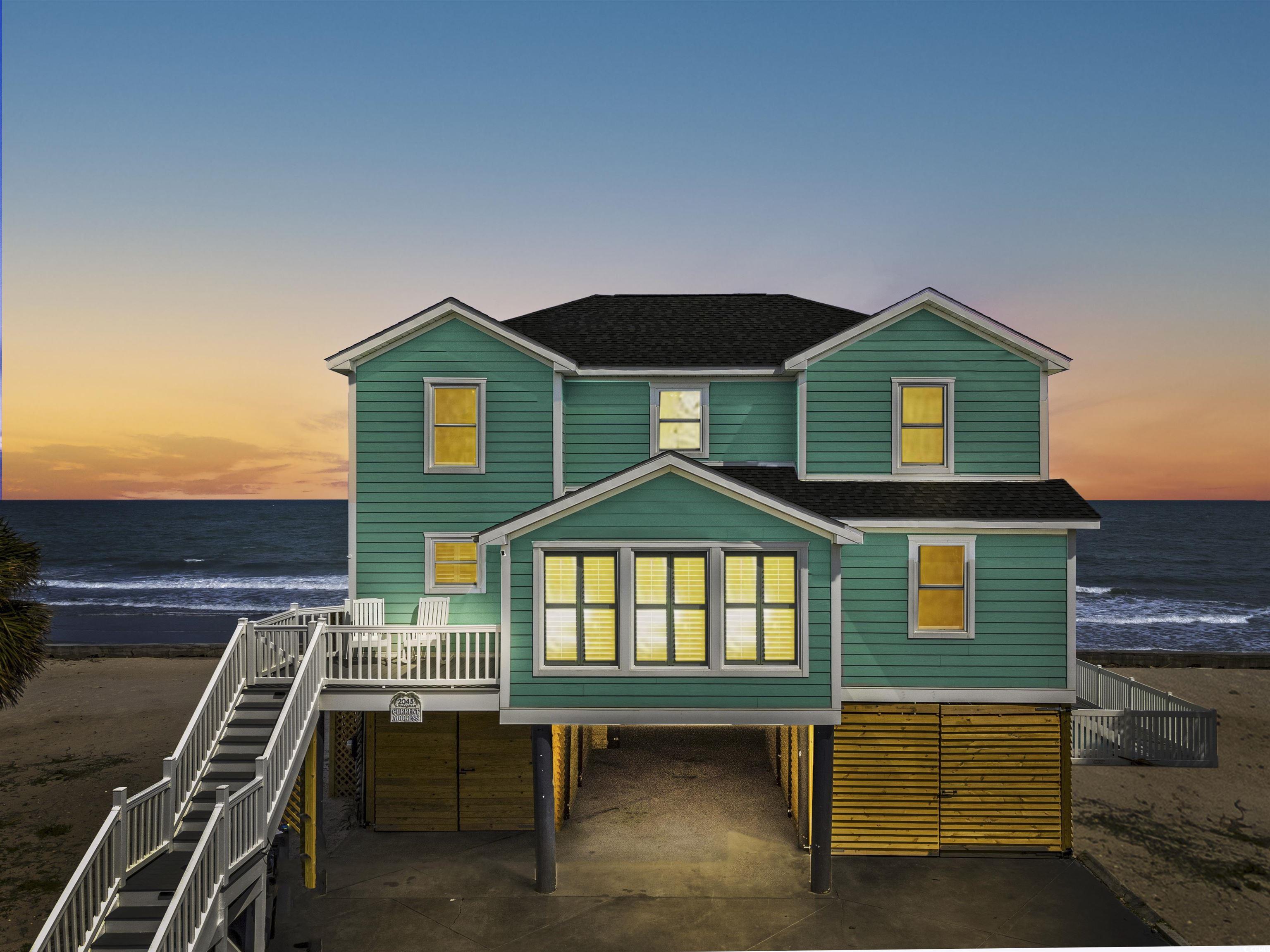 oceanfront paradise awaits you at this 7 bedroom, 4 bathroom home in the prominent community of inlet harbour. offering expansive views of the atlantic ocean, this substantial open floor plan is perfect to entertain large gatherings or relax on the covered porch while soaking in the sunshine and panoramic crystal blue sea views. imagine walking barefoot through your private entrance to the sand, then washing your toes off in the outdoor shower to take a dip and unwind in your private pool. with a community gate serviced by private guards and sold fully furnished along with many updates (new roof, lvp flooring, windows, appliances, and hvac), this turnkey home can be yours. just minutes from the garden city pier, restaurants, entertainment, murrells inlet jetties, and with short term rentals allowed, this home presents opportunities for vacation, investment property, or primary residence.