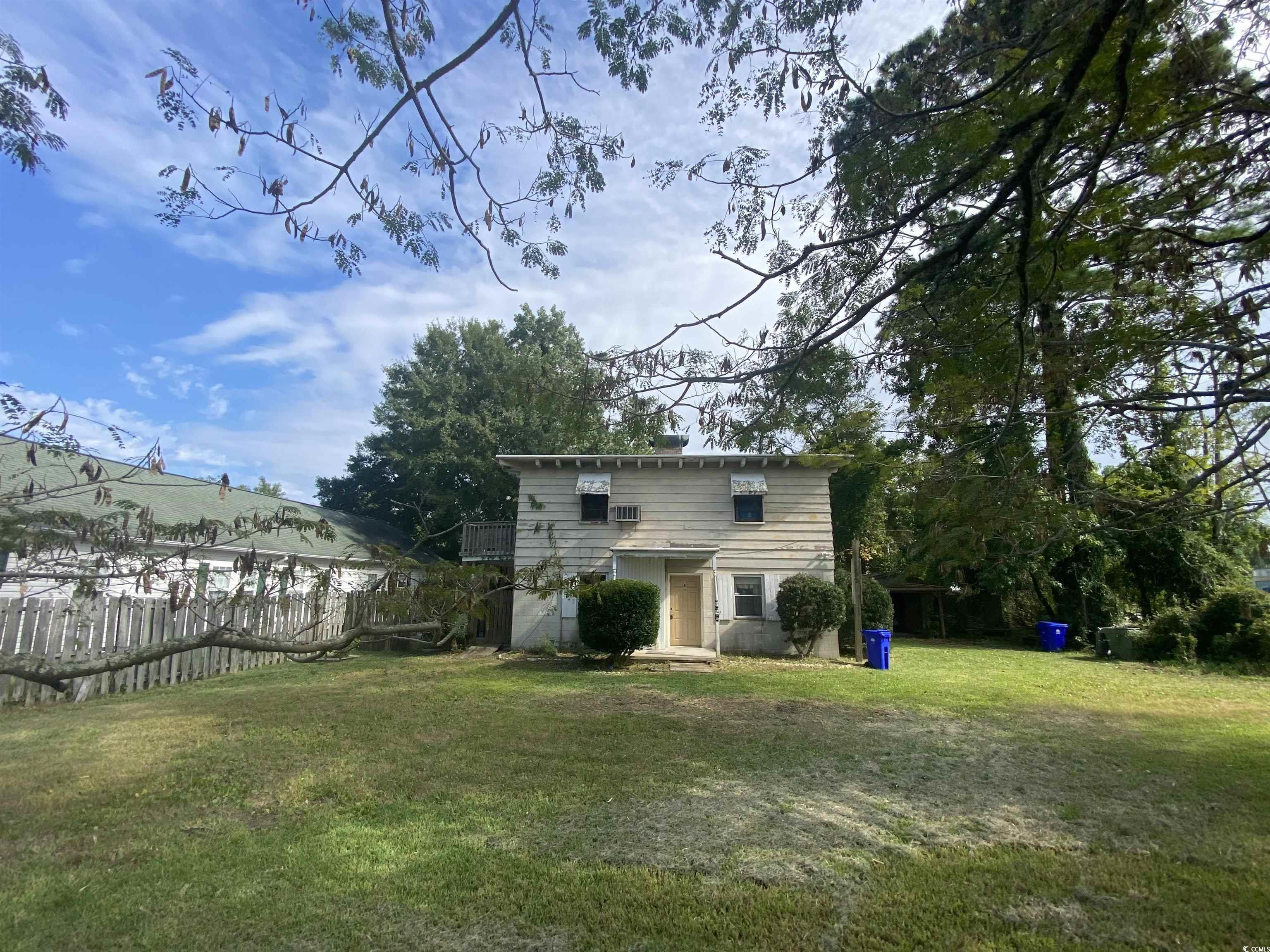 this duplex, sitting on a .22-acre lot and in need of renovation; represents an incredible investment opportunity with its prime location, versatile layout, and potential for customization. whether you're looking for a rental property or your own coastal retreat, this property offers the ideal canvas for your vision. don't miss the chance to make your mark on this surfside beach gem and start living the beach life you've always dreamed of.