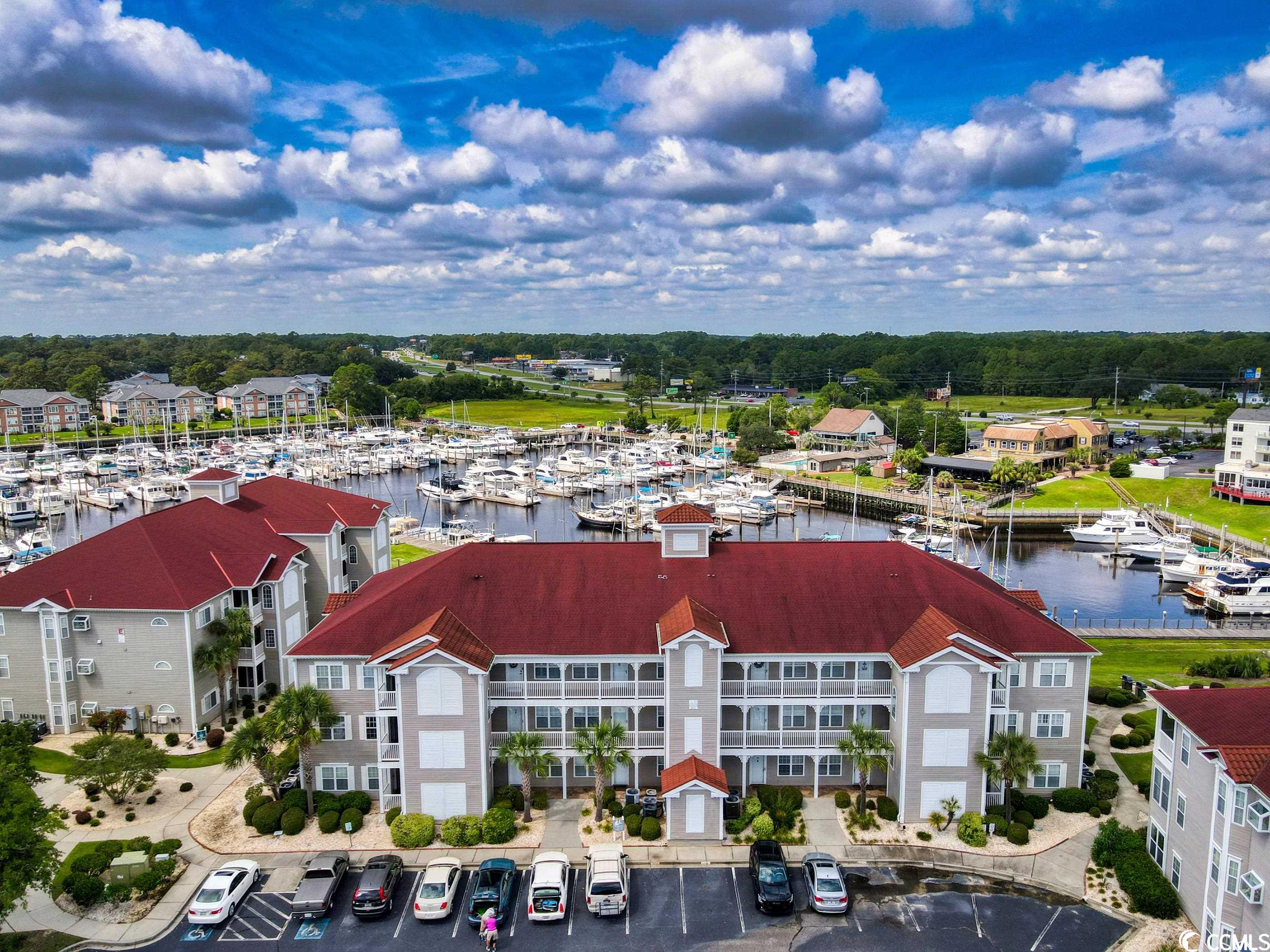 top floor (building with elevator)  with spectacular views of the marine! featuring an open floor plan - 2 bedrooms, 2 baths, with a den/office/sitting room as well!  plantation shutters on all windows and sliding glass doors leading to the screened  in balconey with blinds allowing a fantastic view of the harbour, boats and the marine!  cathedral ceiling in the great/dining area. unit has pergo waterproof flooring throughout. walk the boardwalk around the marina and stop in at the restaurants located directly on the marina - nearby are clarks restaurant and the officers club(membership required).  coquina harbour is conveniently located in little river right of highway 17.