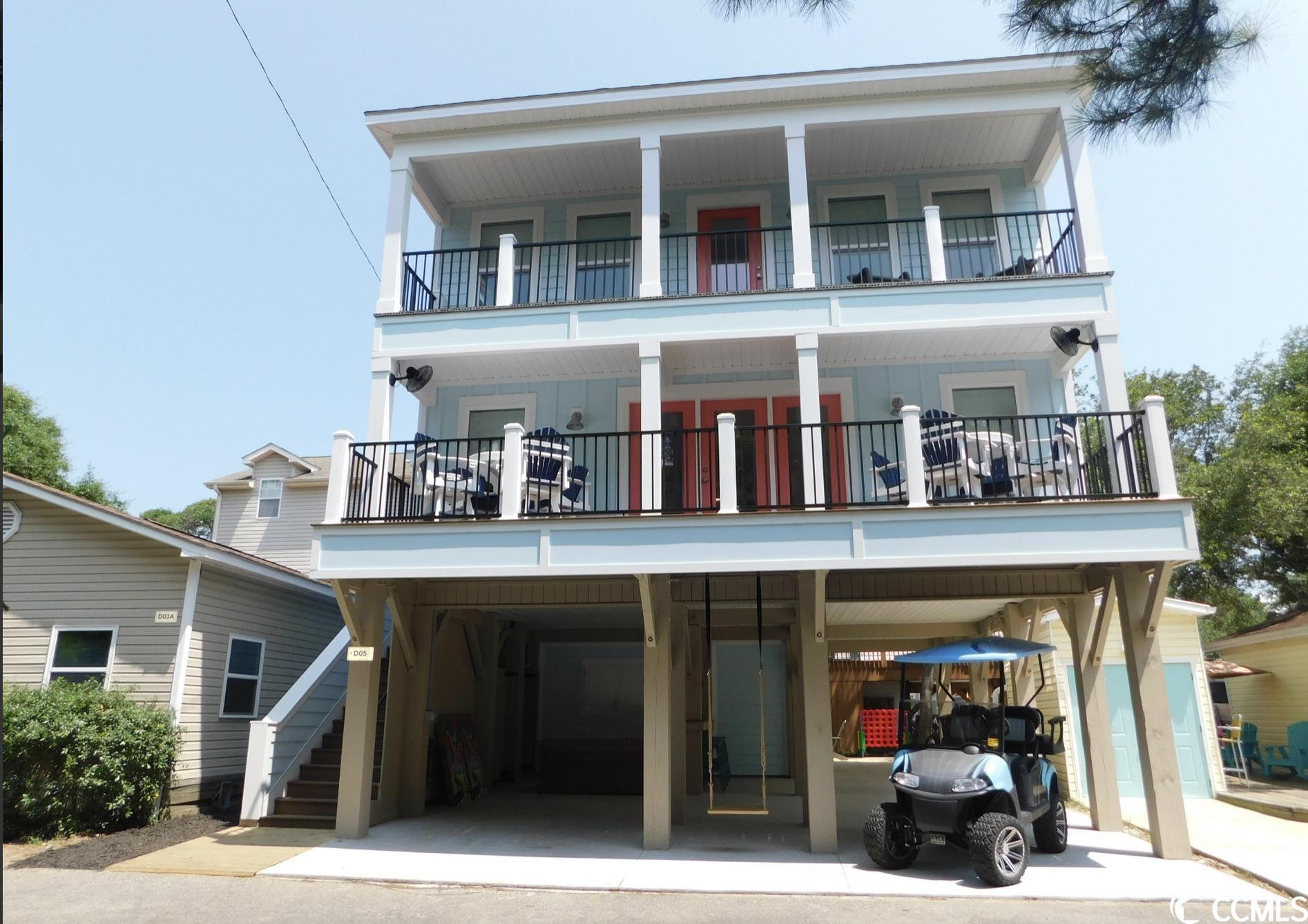 new 4br/3ba home overlooking the canal, just finished in july of 2023! builder's home so there is so much attention to detail hardboard siding, composite decking, 2nd floor under deck drainage system, and transom widows for added light just to name a few. gorgeous open living space connected to the main level balcony! kitchen features stainless steel appliances, induction cooktop, wall oven and microwave, large island with stainless steel sink and double, pull out trash cans. living room has a roku smart tv allowing you to stream all your favorite movies and shows. there is a spacious king bedroom downstairs with a full bath just across the hall. upstairs the second king master bedroom features its own private balcony access, an ensuite with a double vanity, private toilet closet, and 72"'x42" walk in shower. also, upstairs is a queen bedroom with closet and a full over full bunk room with built in storage. the laundry room upstairs offers plenty of space and a window for natural light. each bedroom in the home is equipped with its own roku smart tv mounted to the wall and roll down shades for privacy. you can find two other outdoor living spaces on the ground floor. sit out on the back deck at night and roast marshmallows over the fire pit! play games like corn hole and connect four or chill on the outdoor sofa in the covered living space and watch your favorite team on the roku tv! if you love to fish just a few steps across the street and you can drop a line in the canal and see what you can catch! there is also a single garage for storage, and two outdoor showers on the ground floor as well. this home is within a quick walk from both the pool and the beach making it easy to run back for lunch or if you forgot your sunscreen. while there are no hoa dues within ocean lakes this house is on lot d05 which is a land lease and is paid semi annually. ocean lakes charges a 6,000.00 lease transfer fee as well. ocean lakes has so many amenities you could spend your entire vacation in the park and never have to leave. ocean lakes is gated and features a one mile beautiful sandy beach. trash pickup and cable tv is included with your land lease, and they have 24 hour security. ocean lakes has both an indoor and outdoor swimming pool, a huge splash park, a lazy river, and water slides. also, close to the pool is miniature golf, an arcade and the recreation center where they host so many fun events for all ages. near the beach you can find the playground, full size basketball courts, sandy's down-under skatepark, and a small ice cream shop. there is also a camp store and sandy's meet and eat for those meals that you don't feel like cooking. this place is very special and truly has something for everyone. this house is immaculate and is move in ready. call to schedule your showing today!