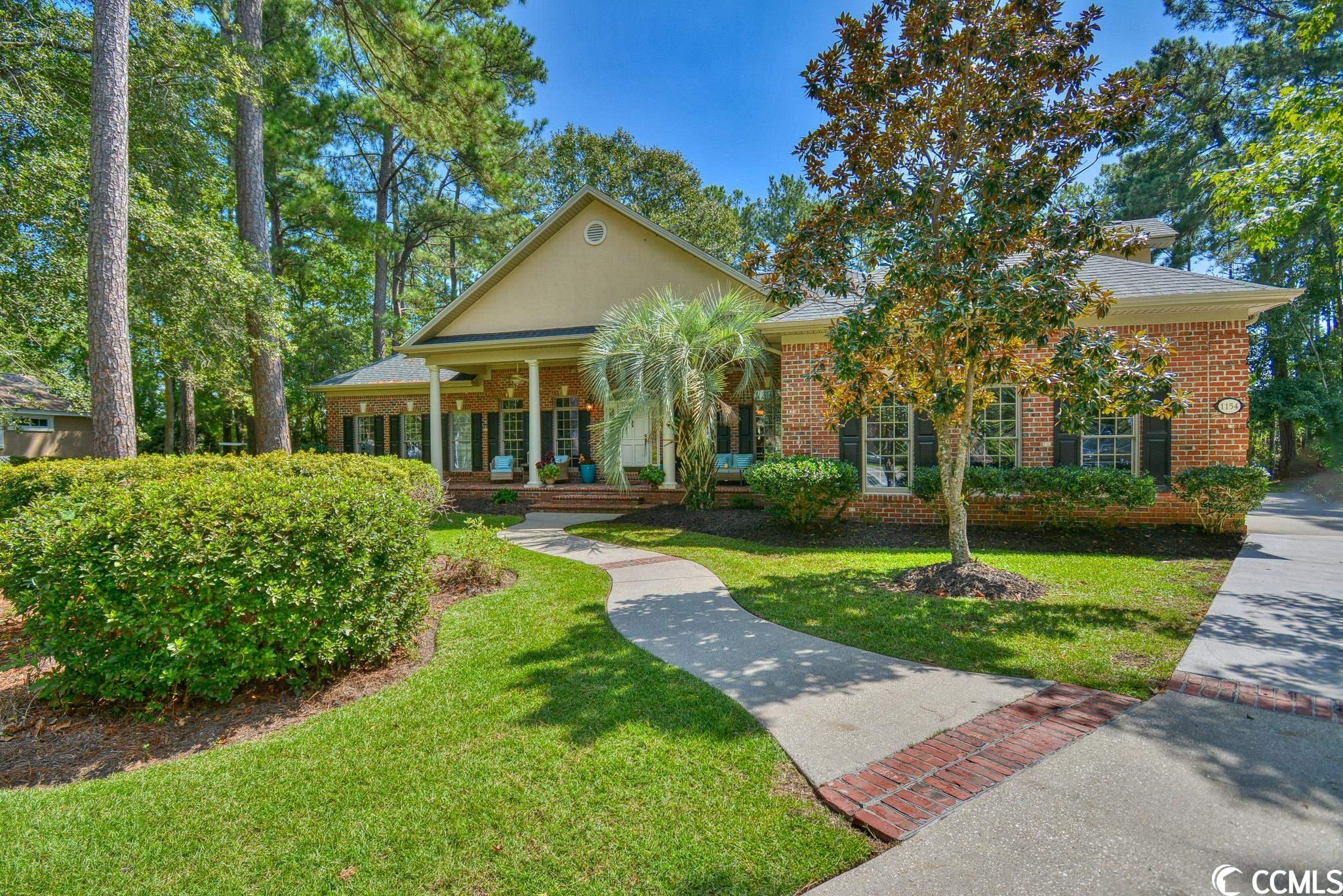 gorgeous 4bed/3.5ba single story all brick home on a .55 acre lot in the sought-after gated neighborhood of prestwick located just 2 miles to the beach and ocean! homeowners enjoy access to the tennis stadium & jr olympic sized pool! this exquisitely 4747sq ft traditional style home exudes elegance from the outside in! as you enter, you'll be greeted by amazing front porch and impeccable architecture. the open concept home has 4 spacious bedrooms and 3.5 bathrooms plus a large dining room, living room, sun room, huge family room, 1200 sq ft wrap around deck, and oversized 2 car attached garage. the gourmet kitchen has gorgeous granite counter tops, stainless steel appliances, sunny eat-in breakfast room. magnificent 1st floor owners retreat with custom master bath featuring beautiful tile, custom cabinets, large shower, & grand whirlpool jetted tub. this captivating home is situated on a large private lot in sprawling community with golf course and lake views at every turn. maintenance free home with new roof, new hvac, new appliances, new kitchen, new bathrooms, new water heaters, new cabinets, and lighting. prestwick golf course is a pete dye design. award winning lakewood elementary school and beach access are less than 1/4 mile away! this community is just a short drive to everything myrtle beach has to offer including: myrtle beach international airport, broadway at the beach, the market common, coastal grande mall, 2-tanger outlets, barefoot resort and coastal carolina university(ccu), marinas, public docks, boat landings, restaurants, golf courses, shops, entertainment. also, only 90 miles to beautiful charleston,sc!