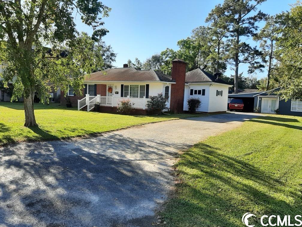 a charming and comfortable brick home with the added bonus of a garage apartment awaits you in the marysville area of georgetown, this 3 bedroom home includes a front porch, large back patio for alfresco dining, large storage shed and garage apartment for extra rental income or family suite or he shed/she shed, etc. the interior has been renovated to open areas through the living and kitchen for entertaining. many storage closets and storage areas. just minutes to the historic district and harborwalk of georgetown, 15 miles to pawleys island beaches and 50 miles south to charleston. buyer responsible for square foot verification. no hoa.
