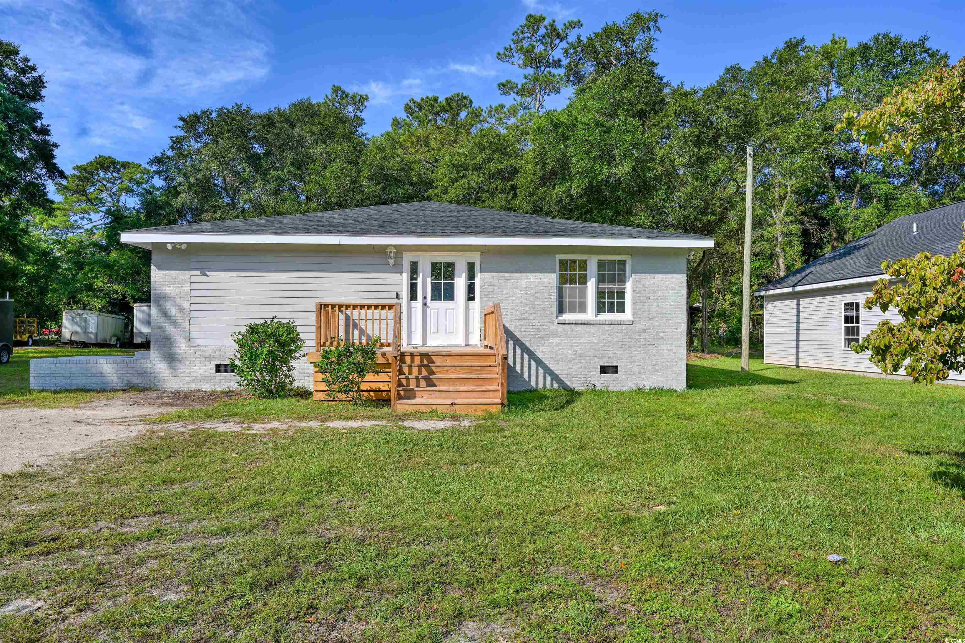 beautifully updated 4 bedroom/3 bath home with no hoa in the heart of little river!  kitchen features newly refinished cabinets, new quartz countertops, new full tile backsplash, new sink, new faucet and stainless steel appliances.  all 4 bedrooms, living room and dining area contain new lvp flooring and the kitchen and baths have new porcelain tile floors.  main bath has stand up tile shower with a glass enclosure, new floating vanity, new faucets and new mirror.  the 2nd bath has a new shower surround, new vanity, new faucets and new mirrors.  the 3rd bath is a jack and jill bath between the 3rd and 4th bedrooms and features a new tub surround, new vanity, new faucets and new mirror.  the main bedroom includes a large walk in closet.  the home also features fresh paint inside and out, new light fixtures, new fans and new front door with sidelights.  4th bedroom could easily be an office or flex room featuring glass double doors.    the fenced backyard has a large shed that can hold your tools, golf cart or whatever extras you may have.  backyard is large enough to hold your boat, trailer or rv.  close to the little river waterfront, beaches and shopping!  call to schedule your showing today!