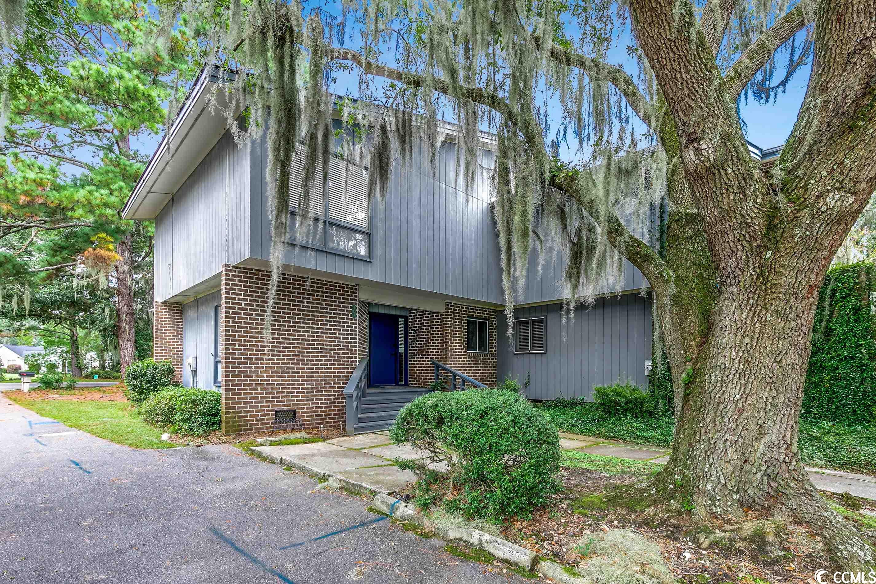 welcome to wedgefield plantation in historic georgetown, sc. this 3 bedroom, 3 bath condo has a unique 70's and 80's retro design. nice room sizes with full wall length windows throughout. large open family room & dining room. french doors open to a large 30x9 screen porch overlooking an open landscape surrounded by true old south moss draped oak trees. 3 bedrooms upstairs plus home office on main floor level. owner's suite has private screened balcony overlooking the large private backyard. the property borders the old ricefields of long ago along the black river. situated within the wedgefield country club with beautiful golf course and clubhouse and wedgefield community boat landing. near shopping, hospital, grocery and more. only minutes to the historic district and downtown area with waterfront dining and shops along the georgetown harbor walk. georgetown borders the winyah bay. several rivers converge at the bay to provide access to scenic boating opportunities; and some of the best salt & fresh water fishing along the south carolina coast. come enjoy the historic scenery, golfing and all the watersport adventure that georgetown, sc has to offer. this condo is in need of some updates and will convey in as is condition. it has incredible potential and a quiet private location.  call today to schedule a time to view this home and community.