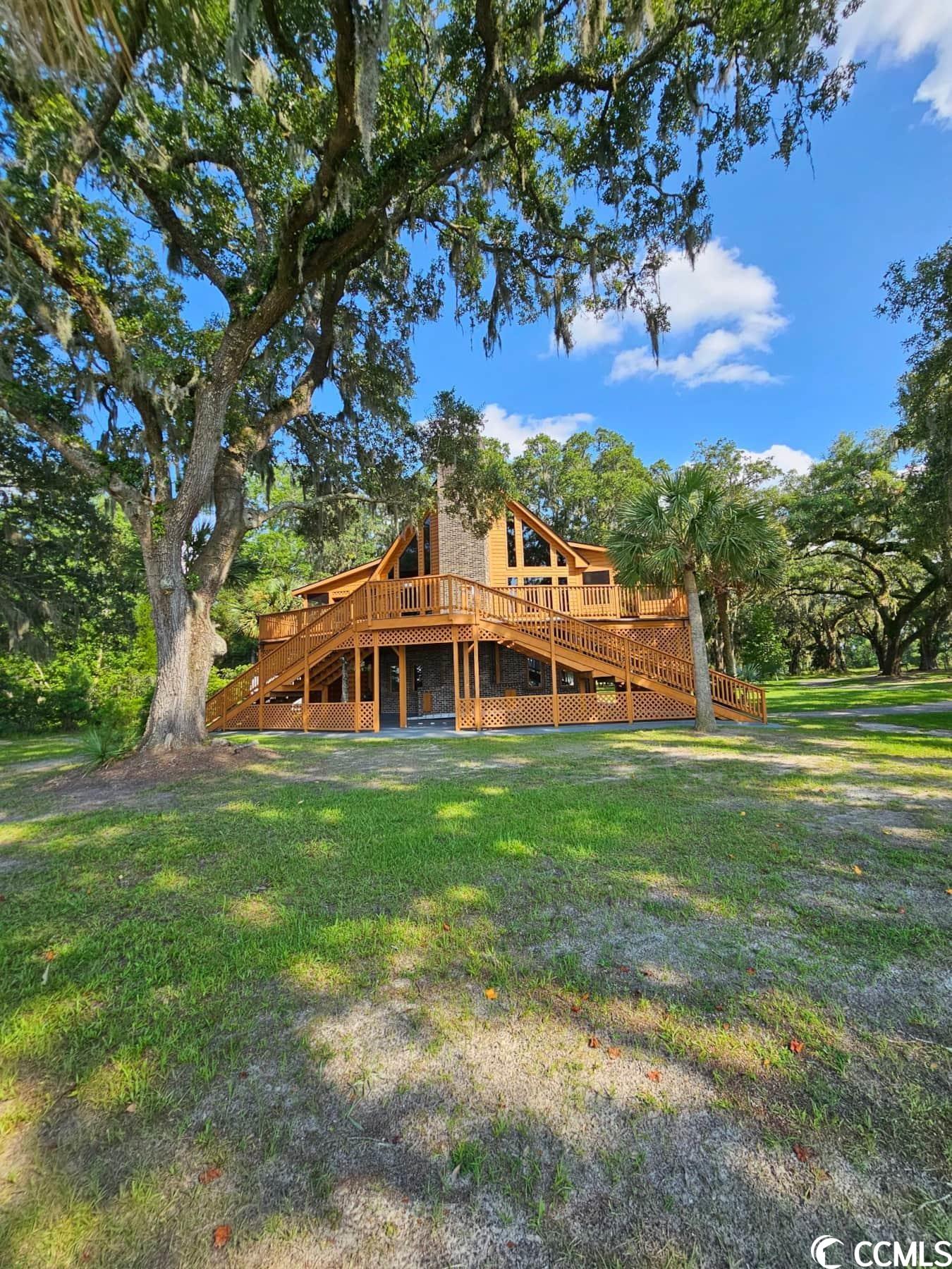 have you ever dreamed of owning a prime piece of deep water front property in beautiful south carolina? as you drive into the property you will be surrendered by breathtaking live oak trees and the swaying of moss welcoming you in. imagine walking outside your front door and taking just a few short steps to your own private dock, overlooking the river as far as you can see, and hearing the peaceful sounds of nature surrounding you. here is your rare opportunity to own a gorgeous river front home on the sampit river in a rural part of georgetown, sc on mauricena plantation. this property is a remarkable investment opportunity such as: vacation rental, wedding venue, dock rentals, etc, the possibilities are endless! or enjoy the property for yourself and your family and all it has to offer. the owner of this home is a sc realtor with home grown real estate. home is being sold as-is.