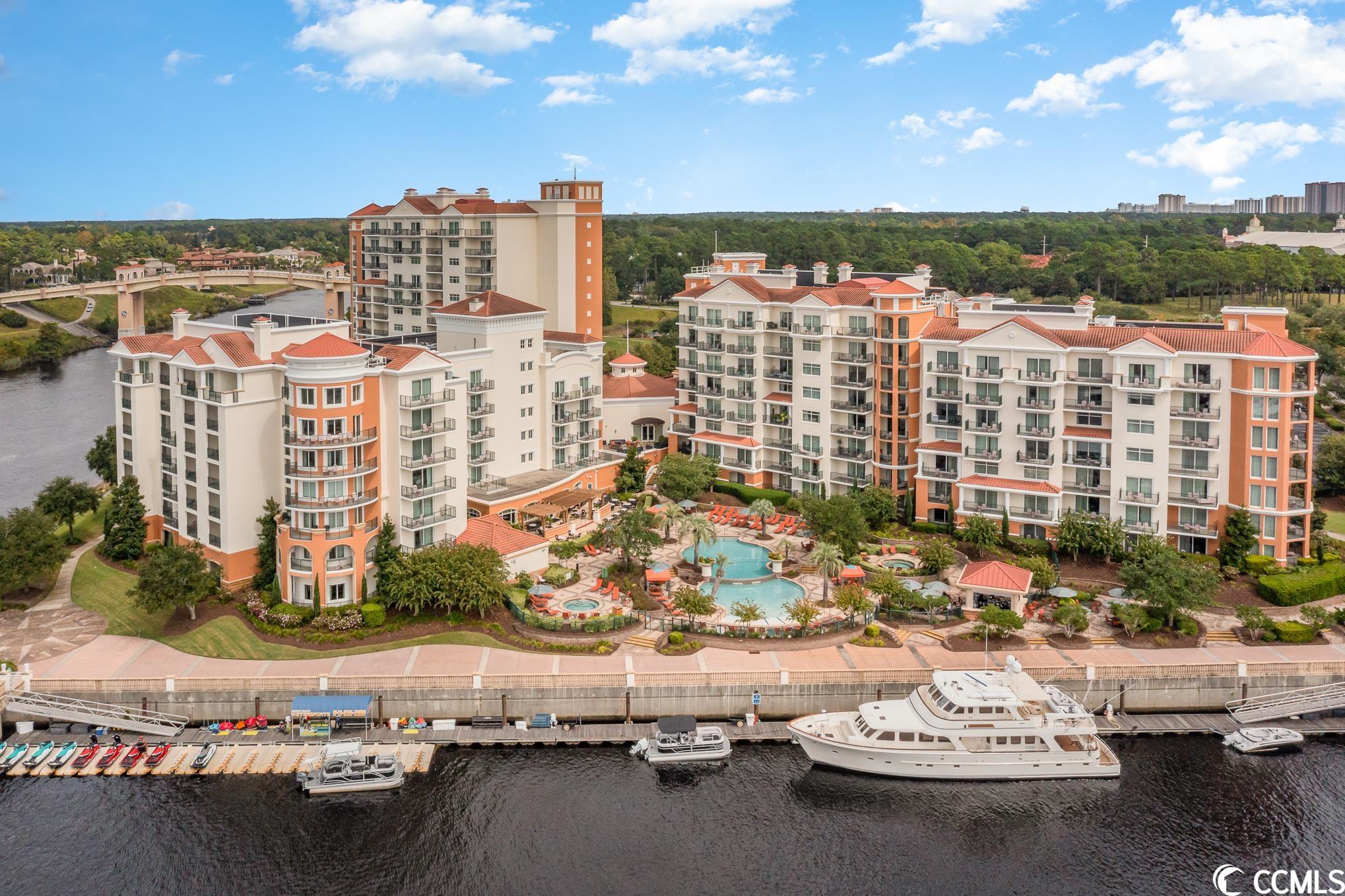 this 2-bedroom 2 bath penthouse at the marina inn is a luxurious and spacious unit located on the top floor of the building 7.  as you step inside, you are immediately greeted by stunning views of the intracoastal waterway and the marina. the open-concept living area features high-end furnishings and finishes, including comfortable seating, a large flat-screen tv, and a fireplace. the main bedroom features a luxurious king-size bed, plush bedding, and beautiful views of the water. the second bedroom is also well-appointed with 2 queen-size beds and its own access to the main bathroom. the highlight of the penthouse is the 2 balconies that includes outdoor seating, and incredible views of the intracoastal waterway and the marina. this rare villa has been updated and comes fully furnished.  the grande dunes is a luxurious residential community located in myrtle beach, south carolina. it encompasses over 2,200 acres of pristine coastal terrain, including private beaches, intracoastal waterway, and freshwater lakes. the homes and condominiums within grande dunes are some of the most sought-after properties in the region due to their unparalleled beauty and high-end amenities. adjacent to the grande dunes is the resort course, a premier golf course that has been ranked as one of the "top 100 you can play" by golf digest. it also features world-class tennis facilities, biking trails, and a private marina. the grande dunes also offers residents exclusive access to its private beach club, which includes a swimming pool, private beach access, and a restaurant.  the grande dunes is a breathtaking community that combines luxury living, breathtaking scenery, and unparalleled amenities.