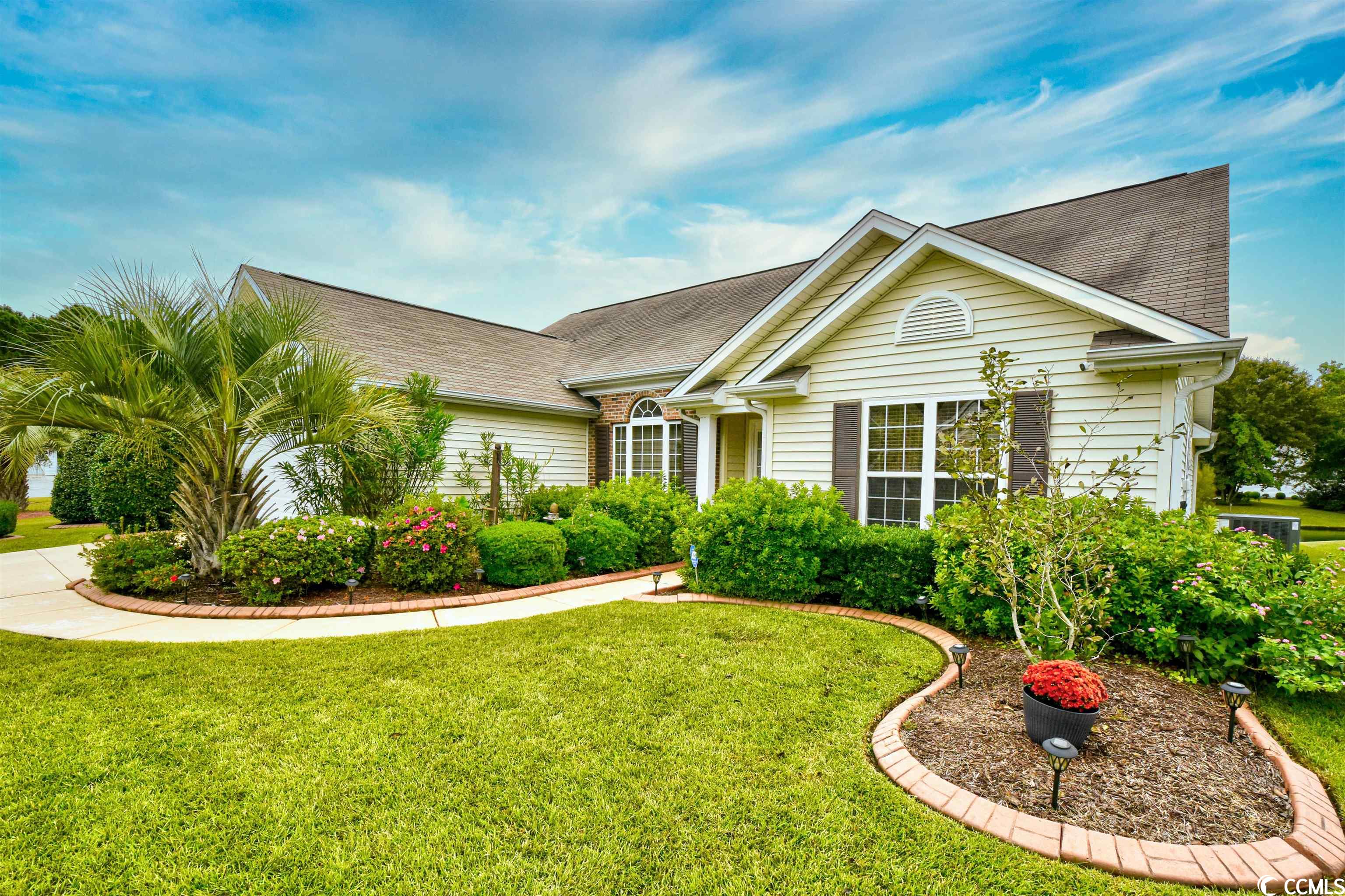 welcome to collins glenn!  this well-cared for home has only had 2 owners since 2006.  as you pull up to this 3 bedroom, 2 bath gem with over 2000 square feet, you see lavish landscaping with palm trees galore, curbscaping lining all landscaping beds, two car garage with epoxy driveway and walkway to front door.  upon entering is an entirely open foyer, formal dining room with chair-rail, and formal living room with tile throughout and cathedral ceilings that expand this large space even more.  this massive sized kitchen has newer stainless steel appliances, huge single sink, work-station and breakfast nook separated by a wrap around breakfast bar.  this open space also shares a family room, opening to a carolina room with spectacular views of rainbows, sunsets and a pond big enough for fishing and even kayaking!  fenced backyard and lots of space to enjoy on an additional back patio perfect for barbecuing! hvac is only 3 years old, water heater 2 years old, appliances 2 years old.  adt security system is also in place.  this community has a great pool and provides trash pickup and cable tv. murrells inlet is one of the grand strands most sought-out cities to live in and homes in collins glenn rarely become available.  close to shopping, medical facilities, and only minutes from the beach!  don't let this one get away....schedule your showing today!