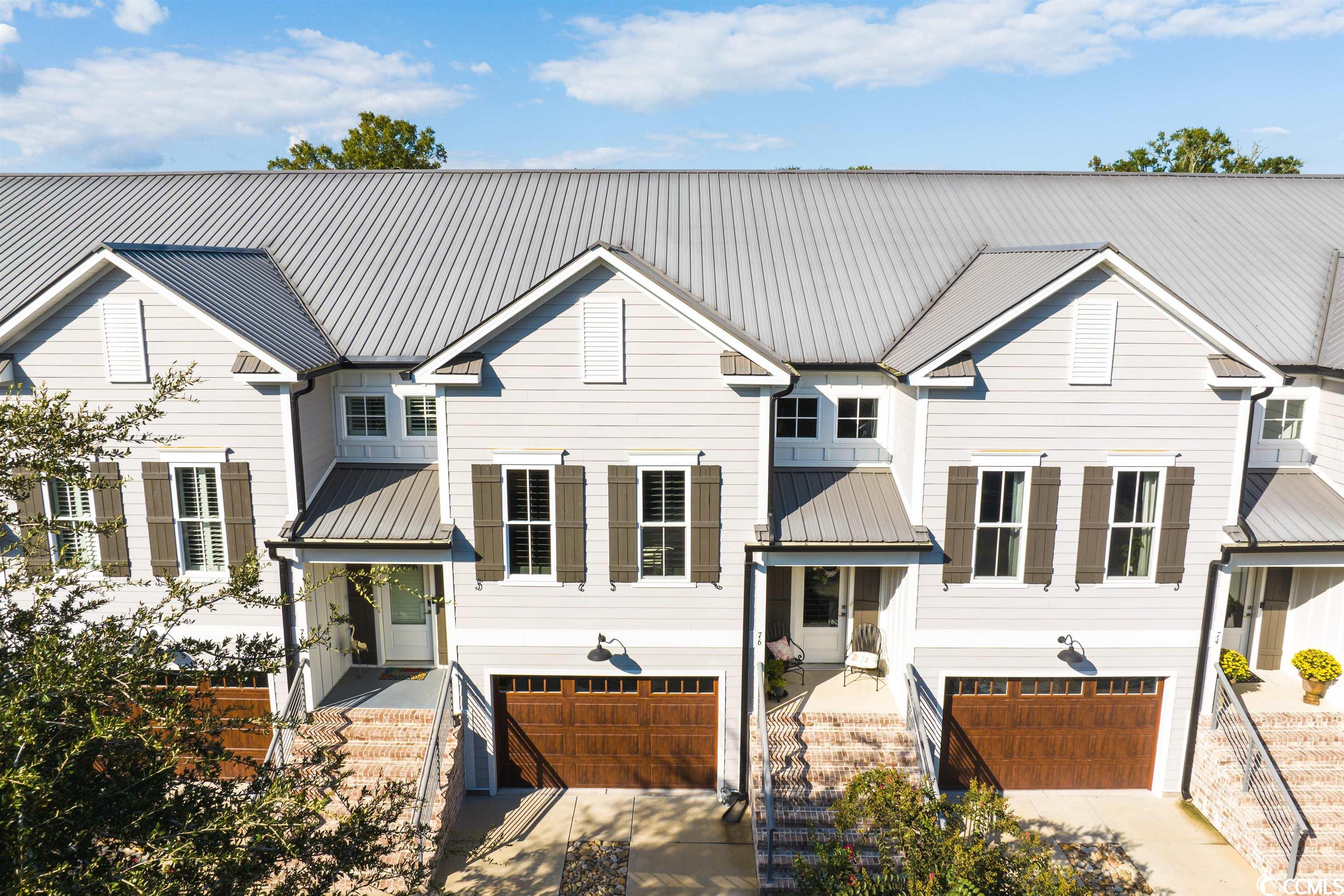 multiple offers in hand: seller calling for final offers by 10:00 p.m. tonight - 11/9/23.  thank you. fall special price improvement! come fall in love w/this 3 bed, 2 1/2 bath townhome; offering beauty, comfort & effortless living. open floorpan - kitchen, dining, & living spaces - is perfect for gathering. the kitchen boasts custom cabinetry, abundance of prep space, quartz countertops, subway tile backsplash, 5-burner gas cooktop, commercial-style ss freezer & refrigerator & a center island w/upgraded hidden cabinets! the living room & dining area adjoin kitchen - accented by shiplap, plantation shutters, a fireplace, & lovely lighting. just off the kitchen - a private powder room, pantry & laundry room. the primary suite completes the main level w/walk-in closet, office/sitting area, & ensuite w/double sinks, tiled seamless shower, & private water closet. the ground level offers two bedrooms that open to screened porch opening to courtyard. a shared bath offers the same same luxurious feel as primary ensuite. an oversized garage, "smart" thermostat, tankless gas water heater finish out this luxurious property. #thanol burning fireplace (no smell and no smoke). please ask your agent about the list of furniture that conveys with the sale of this property.  access to beach house located at 148 atlantic blvd. from the seller regarding hoa's. litchfield (main) services the subdivision, pool, plantation house, beach house and that includes trash pickup. marina village is the second hoa which covers the two buildings with the town houses. it includes pest control, hvac maintenance, landscaping and mowing, water and sewer. again, this information is from the seller.