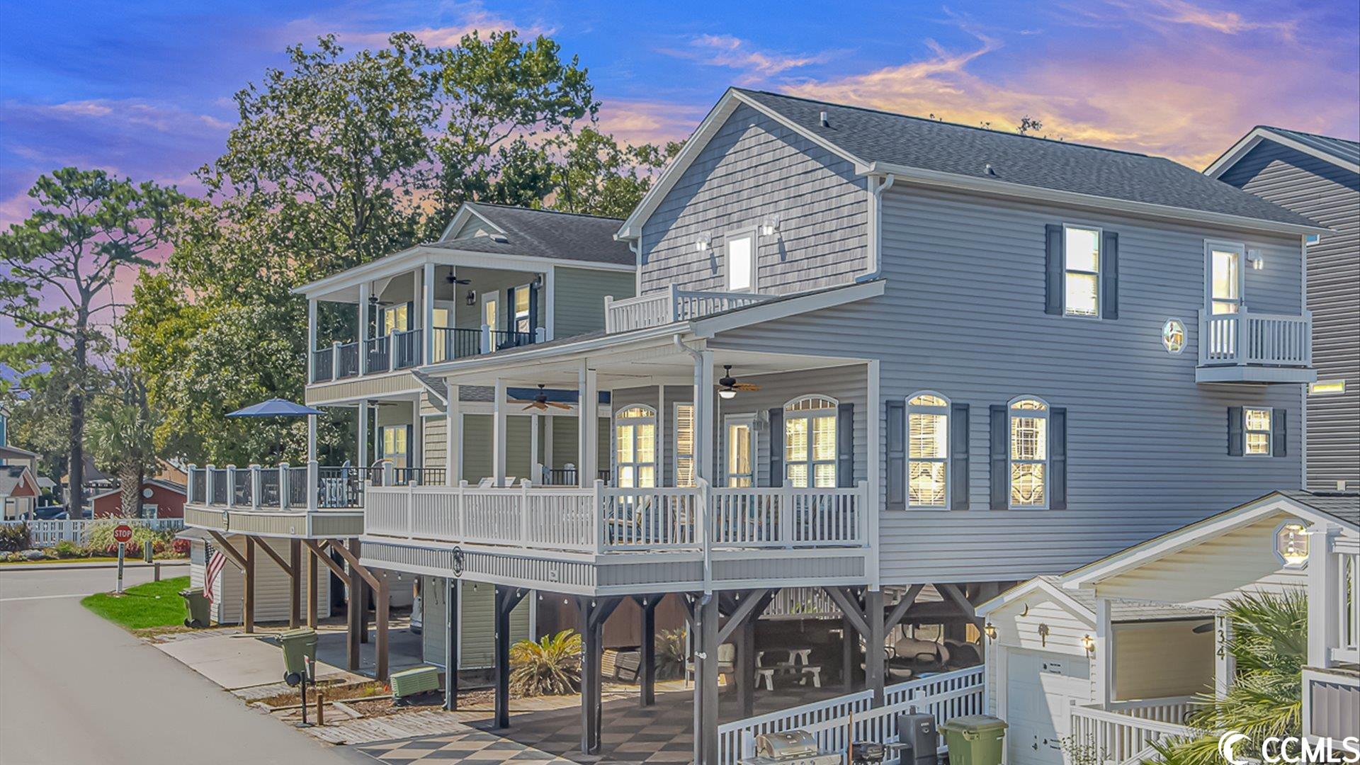 located in award winning an highly sought after ocean lakes campground. this 5 bedroom raised beach home has beautiful pond views, deck w covered area and space to get sun. main floor features the primary bedroom, open kitchen/dining/living room, and a half bath. upstairs you will find the other 4 bedrooms and 2 bathrooms.  beneath the raised main living area you will find enough space to park 5+ cars/ golf cart, a covered swing area, outdoor shower, and storage. this campground boasts an indoor pool, outdoor pool/slides/lazy river, on site laundromat, grill, camp store, rec center and game room. enjoy one of the community scheduled events such as halloweekend, fishing tournaments, bingo, live music, and nightly golf cart parades. the campground is centrally located to shopping, live shows, seasonal yearly auto shows and rallies, and is beach front! this home has one of the lowest lot leases available and has not been a rental.
