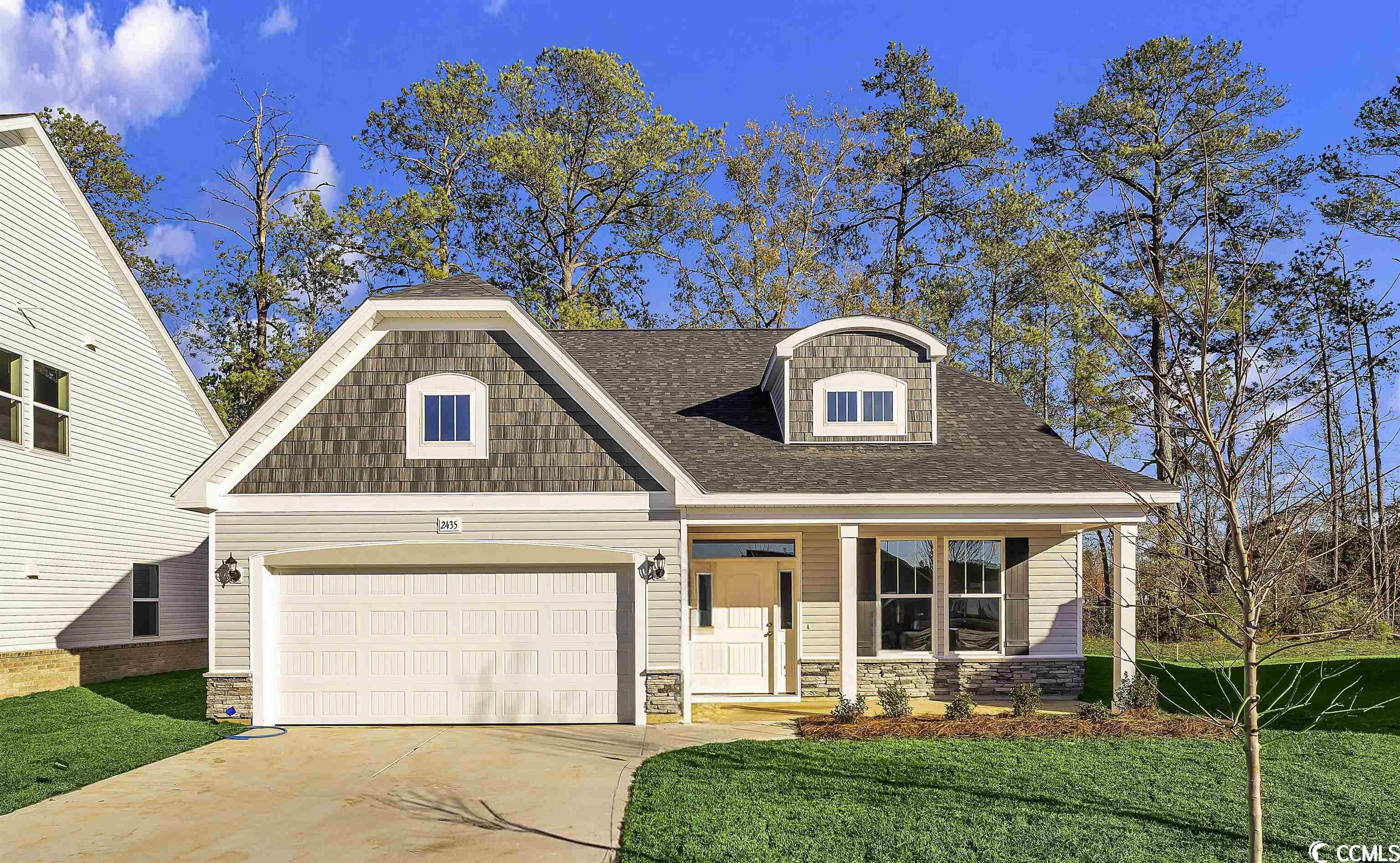 cul-de-sac home site.  front and rear covered porches! vaulted ceilings!  open floor plan with first level primary suite with a bay window!  the popular 4bd, 2.5 bath, kent floorplan by dream finders homes is now available in the spring oaks community located in conway, south carolina.  as you enter the home from the front covered porch, the openess of the home plan is apparent.  this beautiful kitchen features white staggered cabinets with molding detail, subway tile backsplash and quartz countertops.  the primary suite is located on the first floor with a bay window, walk-in closet as well as a primary bath with dual vanities with quartz countertops and 5' shower with a glass shower door.  a powder room completes the first floor. the second level consist of 3 bedrooms, 2 having walk in closets. the large loft that overlooks the great room is perfect as a bonus space for use as an office or additional den.  the walk-in, large storage space over the garage is a must see!! other additions to this home include mohawk wood laminate flooring throughout the main living areas, tile flooring in the baths and laundry, ceiling fans in the great room and primary bedroom, as well as pre-wire for fans in other rooms, pendants and backsplash in the kitchen, comfort height toilets, can lighting in the kitchen. spring oaks kent completion date: approximately january 2024   photos are of a similar kent floor plan.       (home and community information, including pricing, incentive discounts, included features, terms, availability and amenities, are subject to change prior to sale at any time without notice or obligation. square footages are approximate. pictures, photographs, colors, features, and sizes are for illustration purposes only and will vary from the homes as built. equal housing opportunity builder.)