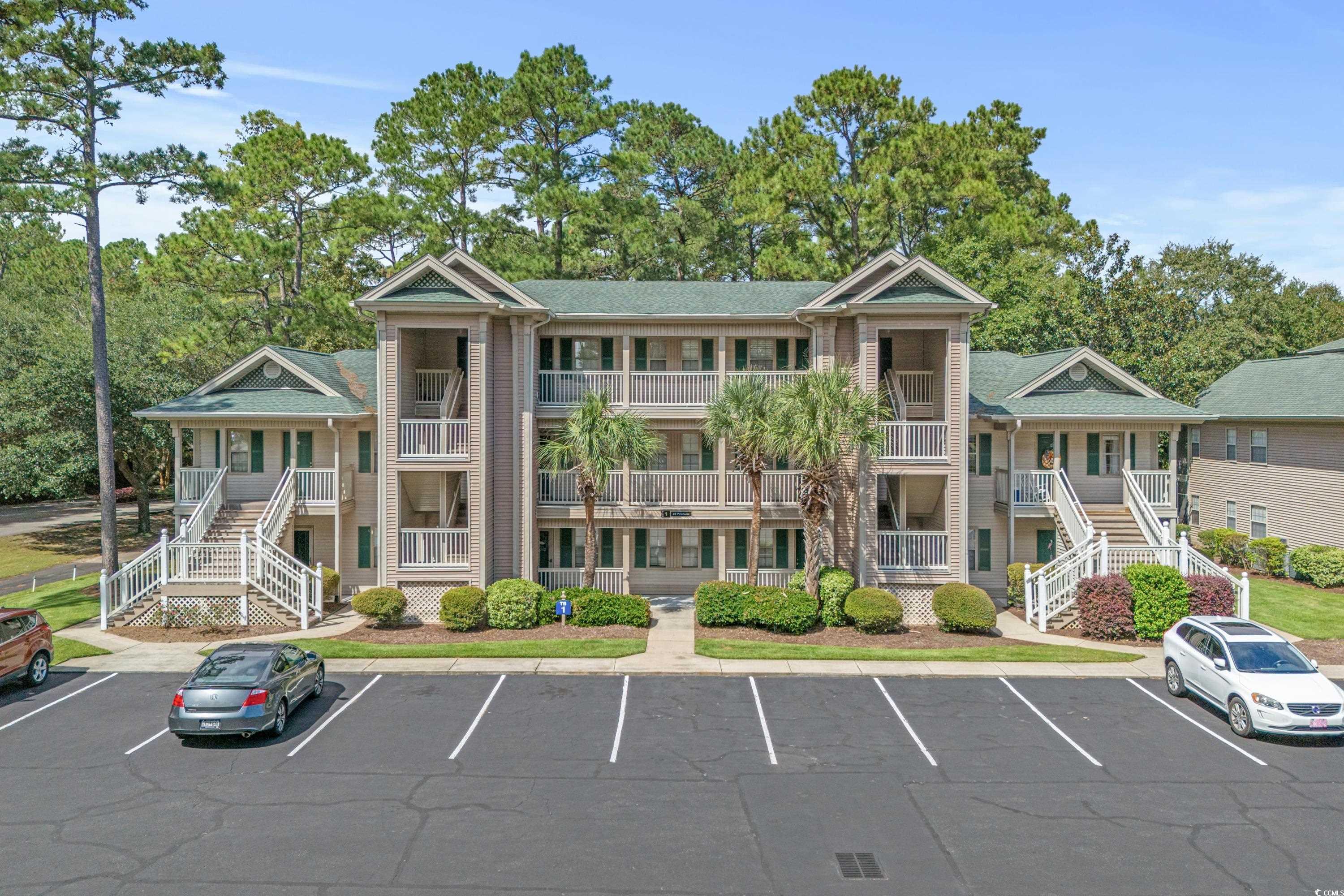 welcome to golf course coastal living at its finest! this charming condominium at 23 pinehurst lane #1-h in pawleys island offers a perfect blend of comfort, convenience, and tranquility. situated in the highly sought-after community of true blue golf & raquet resort, this 2-bedroom, 2-bathroom condo is an ideal retreat for those seeking a relaxed beach & golf lifestyle.   upon entering, you'll immediately appreciate the open and airy feel of the living area and dining space. the spacious living room is perfect for entertaining or simply unwinding after a day at the beach.  the kitchen boasts ample cabinet space, and a convenient breakfast bar, making meal preparation a breeze. enjoy your morning coffee or evening cocktails on the screened porch, where you can take in the serene views of the lush landscaping and golf course.  the primary bedroom suite offers a peaceful oasis with its private en-suite bathroom. the second bedroom is equally spacious and can accommodate guests comfortably.  residents of true blue enjoy access to a host of amenities, including the true blue golf course, an outdoor pool, and tennis courts. just a short drive away, you'll find beautiful beaches, shopping, dining, and all the attractions that pawleys island has to offer.  don't miss the opportunity to make this pawleys island gem your own. whether you're looking for a vacation retreat or a year-round residence, 23 pinehurst lane #1-h has everything you need to embrace the coastal lifestyle.