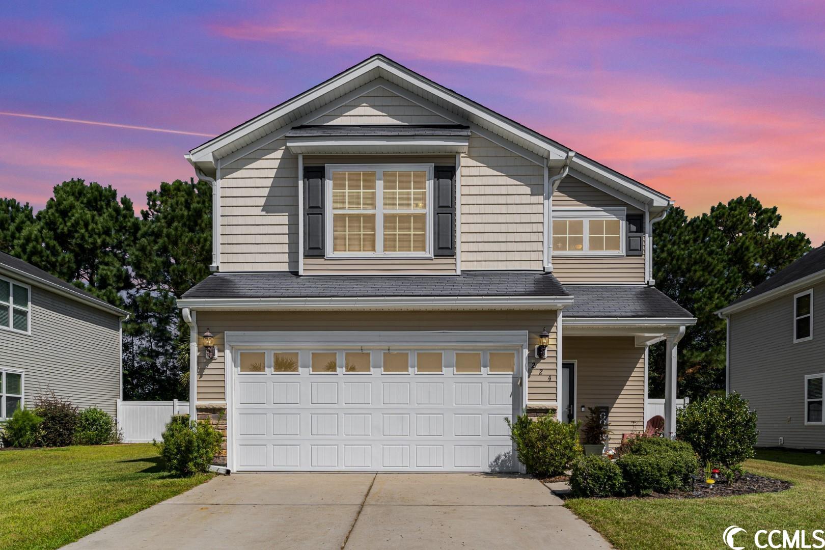 This beautiful 4 bed 2.5 home in the popular Charleston Lakes community is a must see! Features and upgrades abound in this home and include hardwood floors, granite counters, ceiling fans throughout, new HVAC in 2019, new dryer, built in garage shelving and buried gutter downspouts in 2021 and the patio was extended to 12 x 24 in 2022.  Fabulous floor plan boasts a foyer with coat closet, spacious living room with propane fireplace, nice sized dining area and the chef in your family will love the gorgeous kitchen with tons of cabinet space, granite counters, stainless appliances and a pantry plus direct access to the patio-so convenient when entertaining! There is also a fourth bedroom on the first level which would make a great office space and a half bath. Upstairs, a huge loft area is the perfect media room, family room or playroom.  The master suite on the second floor includes a large walk-in closet and bath with double sink vanity, garden tub with tile surround and a separate shower.  An additional two bedrooms, a full bath with vanity and tub/shower and a laundry room with linen closet shelving.  Outside, the fenced yard is perfect for kids and pets and the extended patio provides plenty of room for grilling and al fresco dining with friends and family. The two-car garage and extended driveway allow for ample parking for you and your guests as well. This home really has it all! Charleston Lakes is a quiet, close-knit neighborhood with an outdoor pool that is situated right in the middle of the two large lakes in the center of the community. Located in an award-winning school district and convenient to Murrells Inlet and the Marsh Walk with some many dining options, Surfside Beach, Market Common, the airport, golf, shopping, all the entertainment and attractions the Grand Strand has to offer and best of all, only 5 miles to the beach! Do not miss this opportunity! Schedule your showing to view this lovely home today!