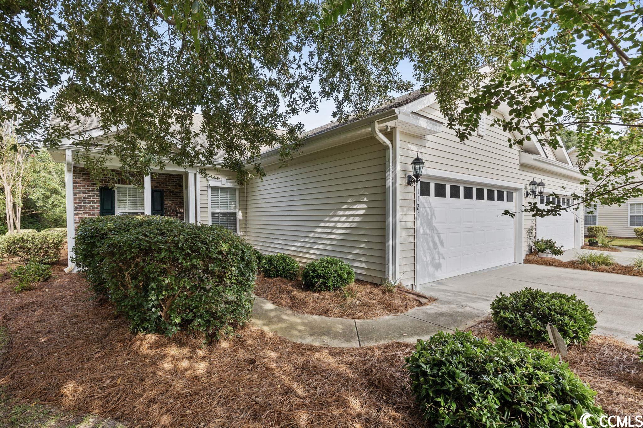 nestled in a serene cul-de-sac within the hidden oaks community in pawley's island, this one-level townhome offers the quintessential coastal lifestyle you've been dreaming of. with the beach a mere mile away, this property presents an unparalleled opportunity to embrace the best of beachside living. this 2 bedroom 2 full bath home comes equipped with everything you need. the graciously sized living area and carolina room offer enough lounge and relaxation for the whole family! the carolina room could also double as a 3rd bedroom. updated kitchen with new quartz countertops and updated backsplash can easily handle all your family meals. updated lvp flooring are found throughout the main living spaces. the main bedroom provides his and hers closets with plenty of storage, ensuite bathroom with dual vanities, and a walk in shower. the perks don't stop on the inside of the home. a two car garage is connected to the home for easy access and plenty of storage space. surrounding the property is stables park, which holds walking trails, dog park, soccer fields, disc golf courses and more! the hoa takes care of the exterior insurance, trash pickup, landscaping, water and sewer, power washing, and much more! this property is a rare find, offering the best of coastal living with the beach nearby, stables park at your doorstep, and a carefree, low-maintenance lifestyle. don't miss your chance to own this slice of paradise. contact me today to schedule a viewing and make your coastal dreams a reality!