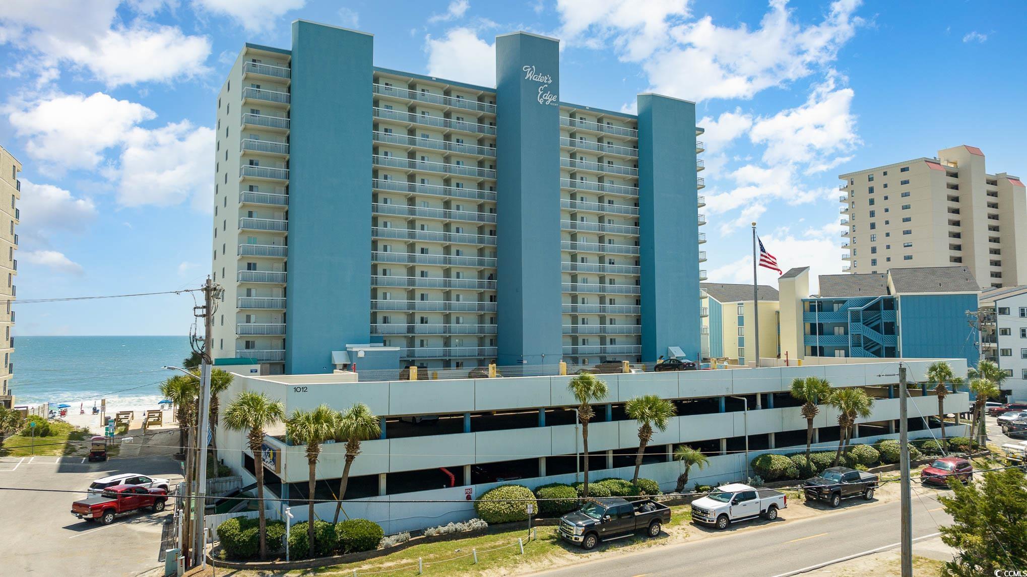 introducing an exquisite 1-bedroom, 2-bathroom condo at water's edge resort nestled between the iconic surfside beach and garden city piers, water's edge resort offers a slice of coastal paradise that words can scarcely describe. this stunning one-bedroom condo promises an unparalleled beachfront experience, with absolutely breathtaking ocean and beach views that will leave you in awe.  upon entering, you'll step into a welcoming foyer, setting the tone for the comfort and serenity that awaits. to the right, you'll find a generously sized bedroom boasting its own private bathroom, complete with a convenient shower/tub combination – perfect for unwinding after a day spent in the sun and surf.  continuing down the hallway, you'll discover another full bathroom, thoughtfully equipped with a standalone shower, ensuring convenience and ease for both residents and guests. adjacent to this, a dedicated washer/dryer closet simplifies beachfront living by offering practical laundry facilities.  the pièce de résistance of this exquisite condo, however, is the combined kitchen, dining, and living area. here, your senses will be captivated by the mesmerizing views that stretch as far as the eye can see. whether you're preparing a delicious meal, sharing a romantic dinner, or simply relaxing on your balcony, you'll have a front-row seat to nature's majestic display. watch the waves dance and occasionally catch a glimpse of playful dolphins as they gracefully traverse the azure waters.  as a resident of water's edge resort, you'll have access to a host of amenities designed to elevate your coastal lifestyle.the resort now boasts state-of-the-art indoor and outdoor hot tubs and pools, inviting you to unwind and refresh at your leisure. additionally, a well-equipped fitness center awaits those seeking to maintain an active lifestyle. for moments of relaxation and socializing, the rising tides bar is conveniently located onsite, providing a welcoming atmosphere for guests to savor drinks and create lasting memories.  whether you're seeking an investment opportunity, a second home, or a full-time residence, this condo at water's edge resort offers the perfect blend of luxury, tranquility, and coastal charm. pack your bags, and let the soothing sound of the waves and the beauty of the ocean be your new daily backdrop. come to the beach and experience the epitome of coastal living in this exceptional condo – your seaside oasis awaits!