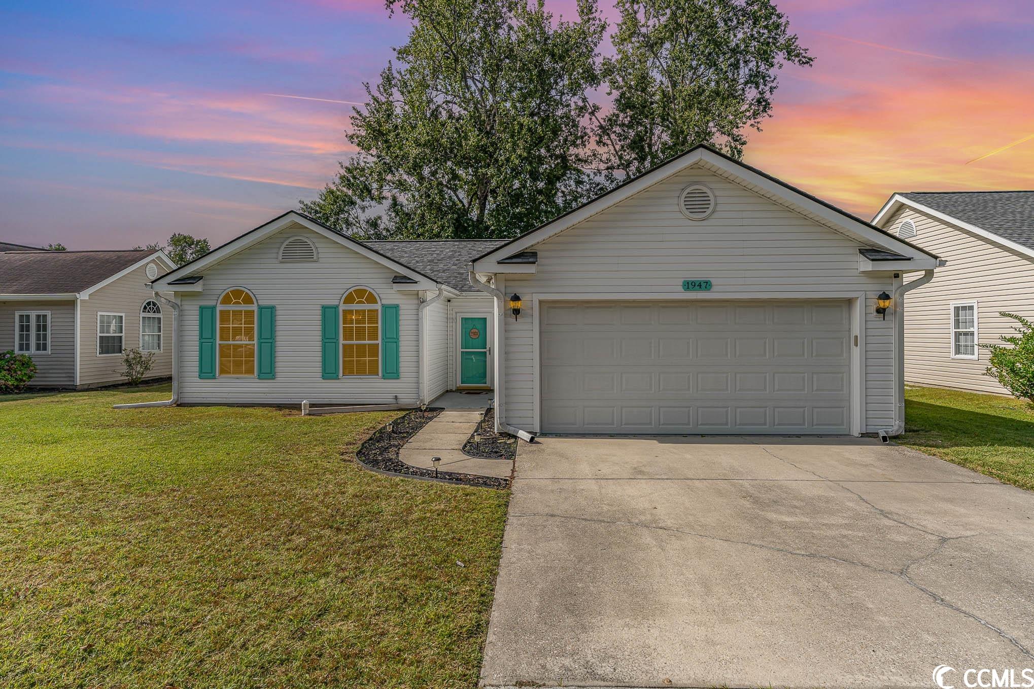 welcome to this well cared for 3 bedroom home just a short golf cart ride to surfside beach! the open floor plan flows from the large family room with vaulted ceilings and a wet bar into the eat in kitchen with custom soft close maple cabinets, an apron front farmhouse sink, stainless steel appliances and a breakfast bar for additional seating. walk out to the fenced backyard with mature, shade providing trees as well as an attached 2 car garage and low hoa.  freshly painted with new lighting fixtures and ceiling fans throughout the property and a new roof in 2022.  don't miss out this one won't last long!