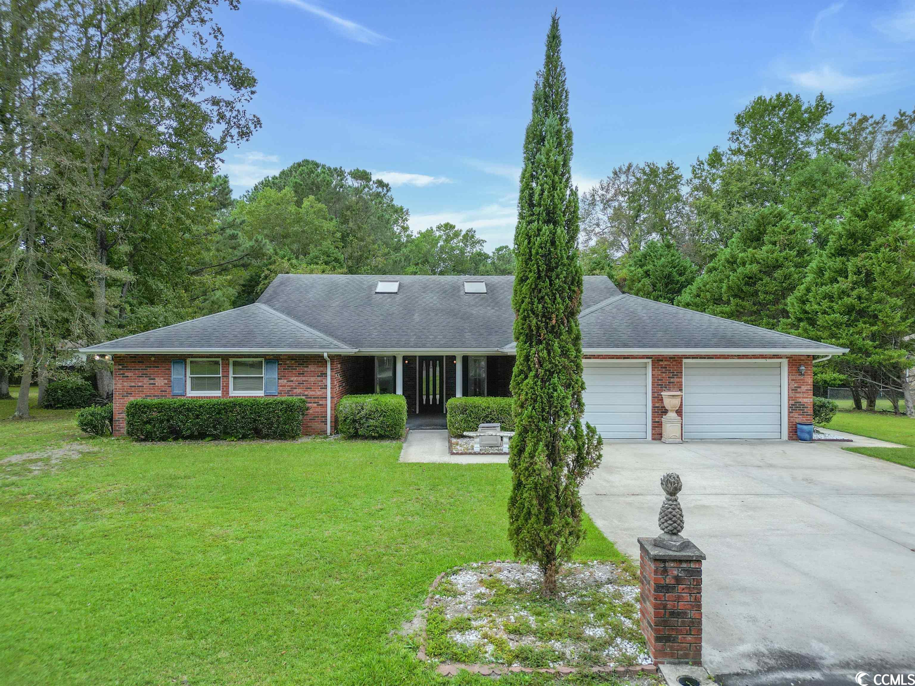 welcome home! this 3 bedroom, 2 ½ bath rancher with a den and built-in pool has so much to offer. you cannot go wrong with this well-maintained 2093 sq. ft. home with five skylights to add additional natural sunlight to the already bright interior. large windows throughout create a bright and inviting ambiance throughout the home. as you enter the home, you'll be greeted with a spacious living area with soaring ceilings, a skylight, and large windows that let in all that natural light. the kitchen and dining room combo with a wet-bar provide an inviting area for family gatherings. the kitchen area has beautiful wood cabinetry, tile backsplash, triple stainless sink, tile flooring, and pass-through to the formal dining area. the dining room features tiled flooring, large windows and a ceiling fan adjacent to the wet-bar. adjacent to the kitchen/dining area is the laundry/utility room leading to the attached 2-car garage offers room for storage. there is plenty of offroad parking for guests or a growing family with room for four vehicles in the driveway. the master suite features a separate shower and toilet with skylight, recessed single vanity with large mirror, and large linen closet discreetly hidden behind the bedroom door, large walk-in closet with built-in shelving in fully carpeted room with large windows and ceiling fan. the two additional bedrooms are spacious and well-appointed, each featuring ample closet space and large windows that let in plenty of natural light. there is a full bath with single vanity, tub/shower combo, with tile floors. the den, with tiled floors and full-length windows, offers a private sanctuary that sits just outside the master ensuite that can serve as an office, secondary family room, or your own piece of paradise as you choose. open the door and step outside to your private outdoor oasis featuring a sun-soaked deck, and a beautiful backyard. outside, you'll find a landscaped backyard with a concrete patio/deck for minimal maintenance, perfect for outdoor dining and entertaining. the large in-ground deep salt-water pool grades from 4-feet to 9-feet, built in 1999 has been well maintained and it shows. the deep blues and crystal-clear water draw you in. the pool is surrounded by an oasis of natural landscaping and hand selected décor to convey with sale. exterior sheds provide ample storage space. all brick siding is easy maintenance and there is an expansive deck out back with great possibilities for outdoor living. out front, you can enjoy the quiet sounds of nature around you from the spacious porch, while in the back there is a spacious deck perfect for hosting get-togethers or simply enjoying the beautifully landscaped, fenced-in backyard. this quiet little neighborhood has no hoa and is convenient to everything in little river with the beach just ten minutes away. with a fenced in yard, amazing pool, and large patio, this home is perfect for relaxing or entertaining. you’re just minutes from golf courses, shopping, restaurants, medical care, and so much more. schedule your tour of 4117 schoolhouse lane today!! it could be your forever home.