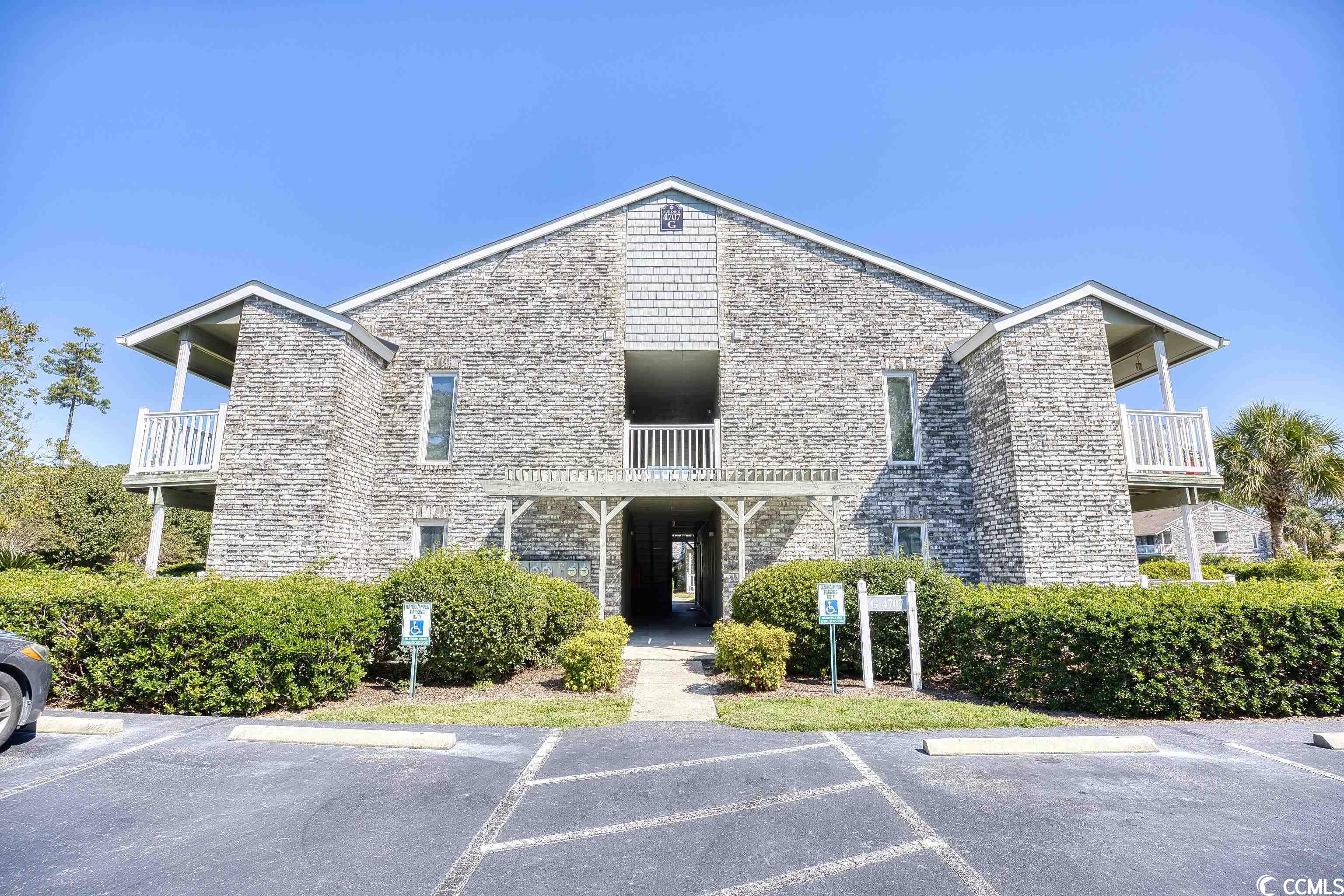 this beautiful first floor end unit is located in the serene community of cobblestone. the neighborhood is surrounded by great dining and shopping options and is only a short drive to the beach and surrounding golf courses. a welcoming foyer greets you when entering the home with a nice coat closet for ample storage. the condo is outfitted with updated flooring, fresh neutral paint, and lots of natural light! all the new furnishings convey with the sale. the kitchen stands out with clean countertops, a large pantry, and new stainless steel appliances. the stackable washer/dryer is located out of the way in the large bathroom. a breakfast bar transitions you out of the kitchen and into the dining room/living room combo! the space is complete with a electric fireplace to create a cozy atmosphere. the open floor plan continues onto the large, covered patio complete with a cedar lined outdoor storage closet. the patio overlooks the beautiful yard, providing privacy and a peaceful setting. the sliding glass door allows you to enter the master bedroom directly from the patio. the tranquil master bedroom has a walk in closet and an ensuite with a walk-in shower and updated vanity. this property is the perfect place to call home! make it yours today!