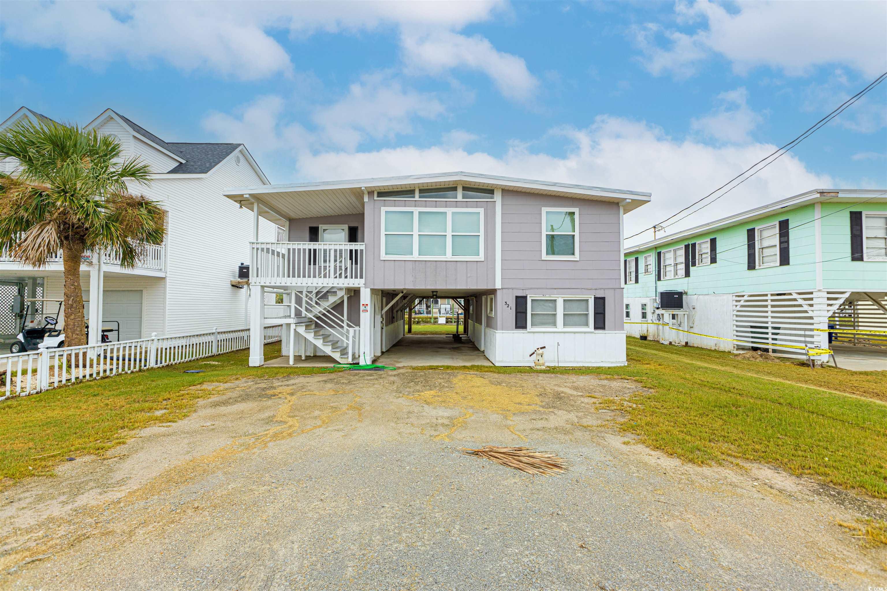 welcome to your own slice of paradise, being offered mostly furnished! this beautiful remodeled raised beach house on a cherry grove channel offers stunning waterfront views and plenty of space to relax and entertain. with 3 bedrooms and 3 bathrooms, this home has everything you need for comfortable coastal living. in 2021, almost the entire home was remodeled, including a new roof, most windows, lvp flooring throughout, and fresh paint. in addition, new kitchen countertops were installed, new bath fixtures, new vanities, new storm doors, new exterior doors  upstairs, exterior paint, and much more! step inside and you'll be greeted by a bright and open living room, complete with plenty of natural light and easy flow to the rest of the home. in the back, a deck offers an incredible view of the channel and is ideal for entertaining or simply taking in the views. and underneath the home, you'll discover covered parking, storage areas, and an entertaining space that offers great views. located in the desirable cherry grove area of north myrtle beach, this home offers convenient access to all the best that the grand strand has to offer. you're just minutes from the beach, the intracoastal waterway, myrtle beach park and sports complex,barefoot landing, tanger on 17, great golf and mini golf courses, tons of incredible restaurants, and endless entertainment. and the best part? there's no hoa, so you can enjoy your piece of paradise on your own terms. don't miss out on this incredible opportunity to own a beautiful home in one of the most sought-after areas of north myrtle beach. schedule your showing today!